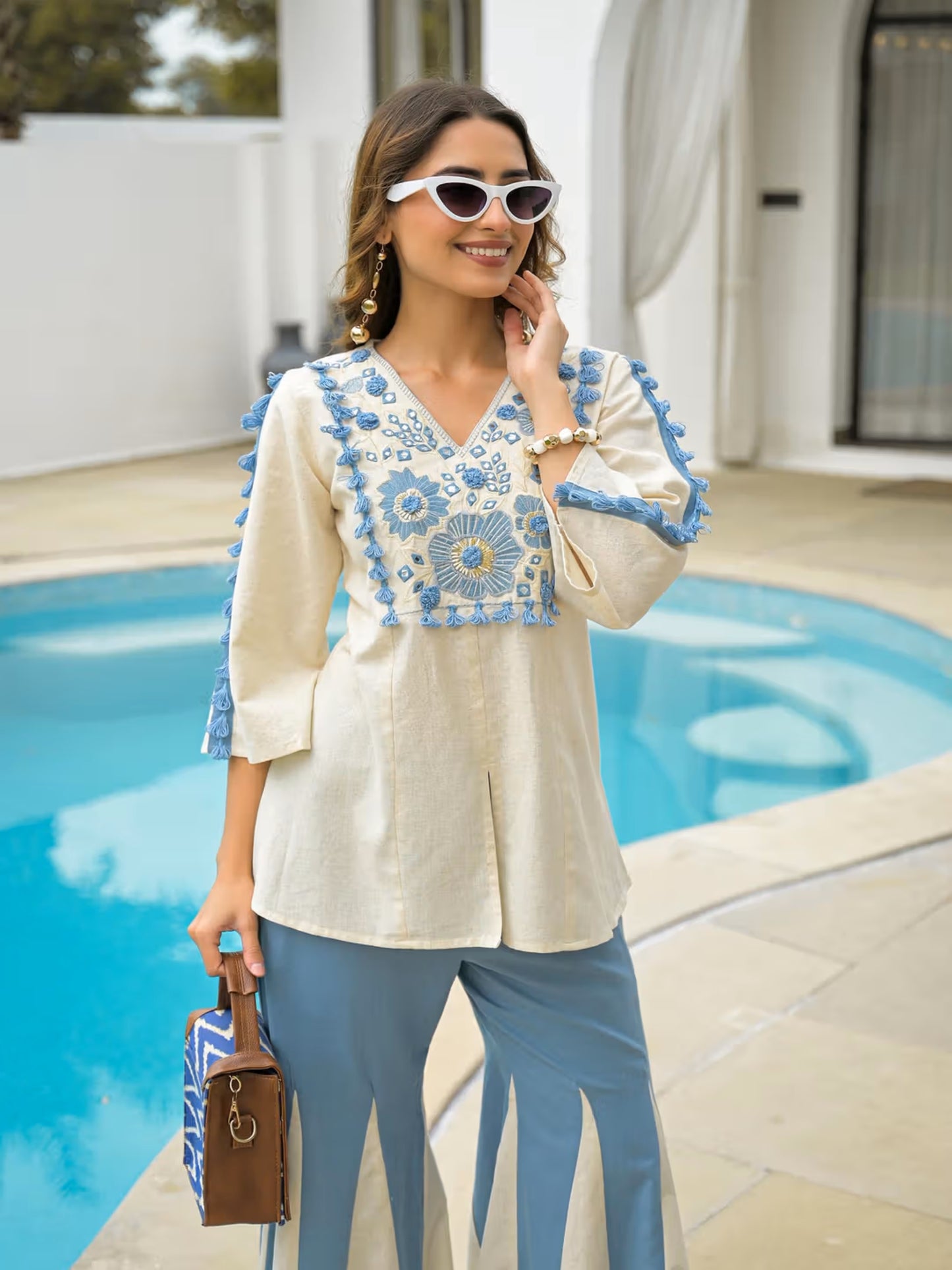 Women's Off White Blue Embroidered Rayon Co-Ord Set With Flared Palazzo Pants for Indo-Western Wear