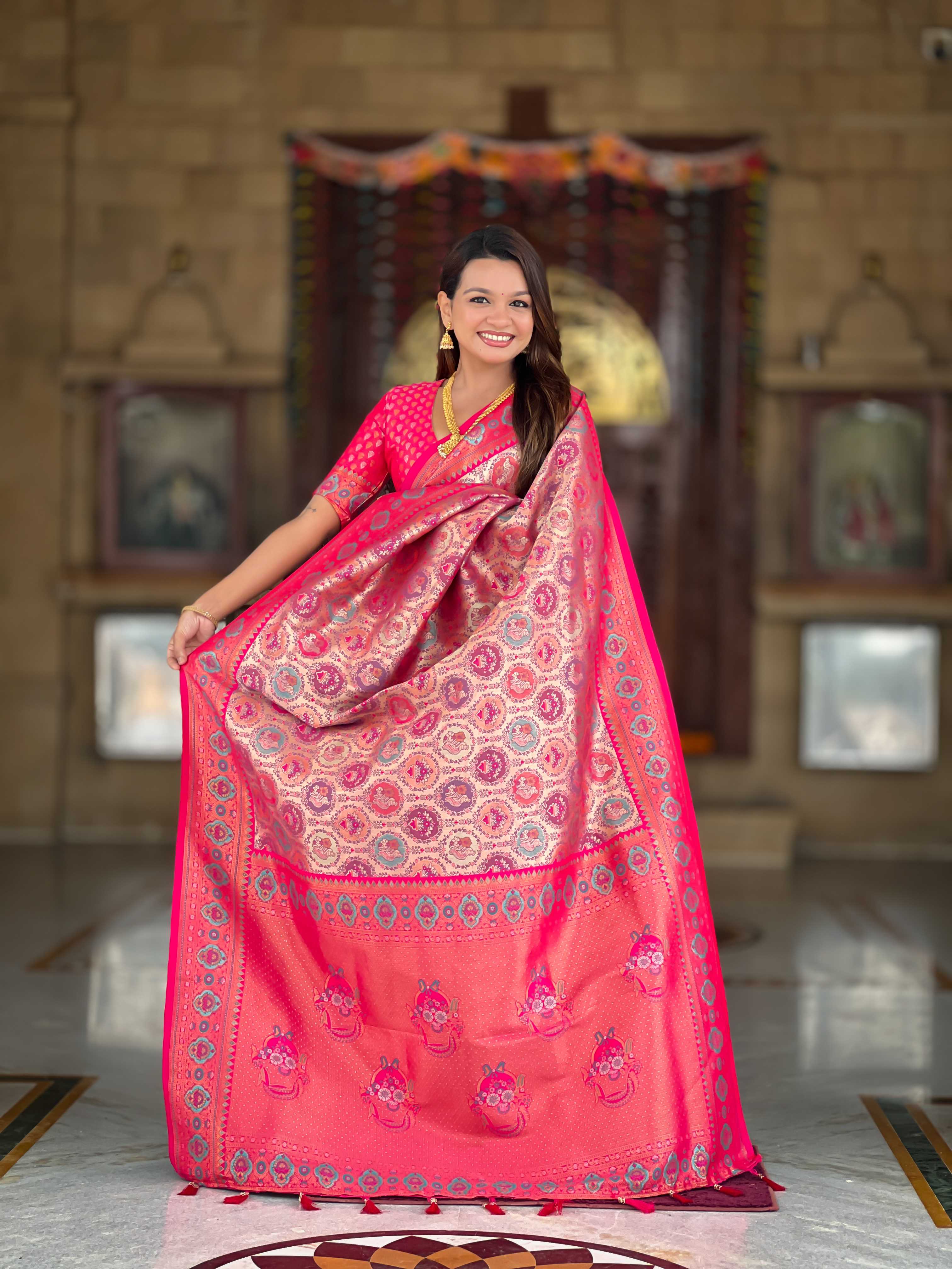 Pink Soft kanjivaram silk saree with zari weaving Meenakari design all over the saree & Meenakari weawing Rich pallu with Meenakari weawing swan border & tessels attached at Pallu End. Blouse :- Soft silk weawing blouse piece