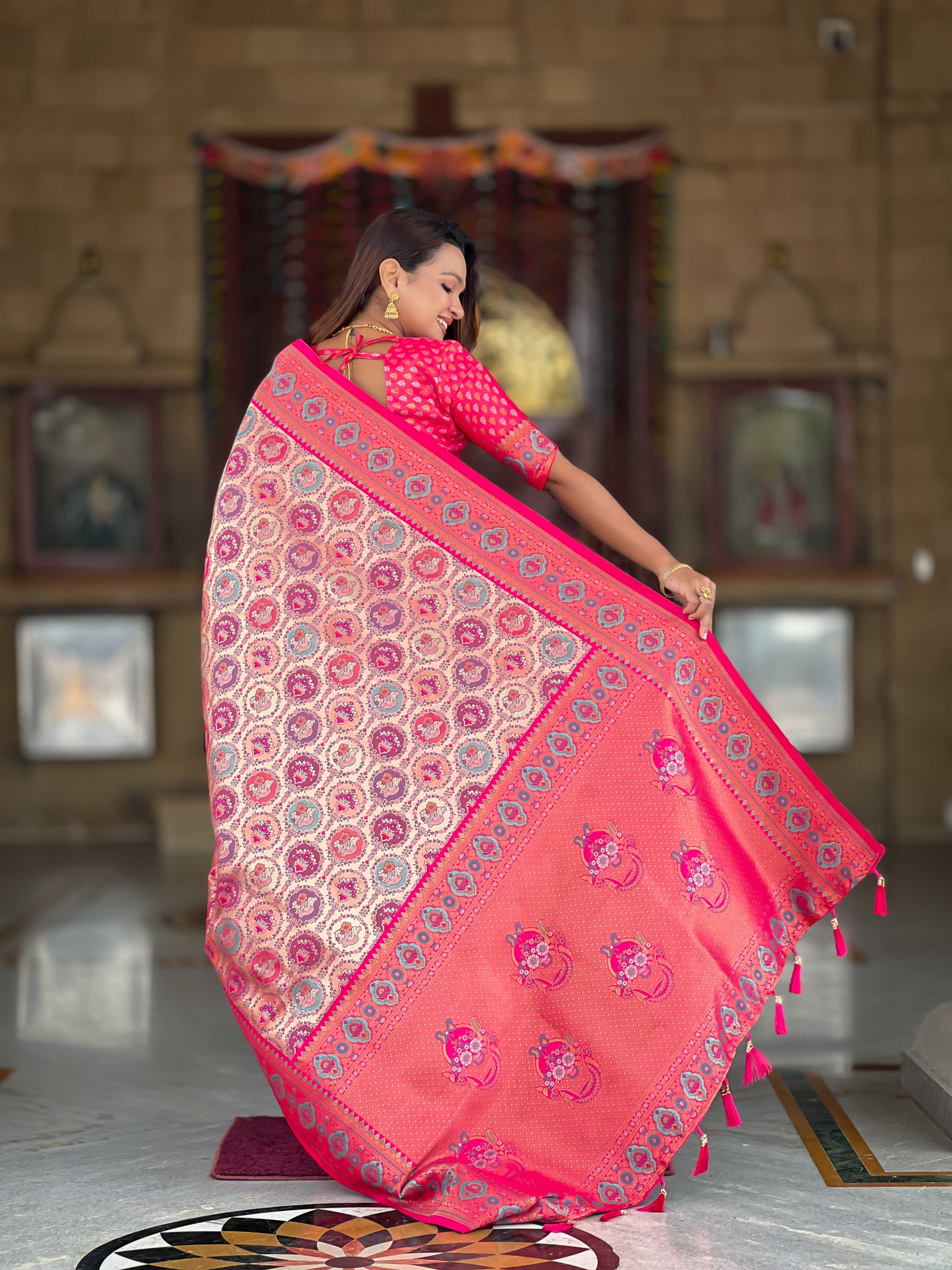 Pink Soft kanjivaram silk saree with zari weaving Meenakari design all over the saree & Meenakari weawing Rich pallu with Meenakari weawing swan border & tessels attached at Pallu End. Blouse :- Soft silk weawing blouse piece
