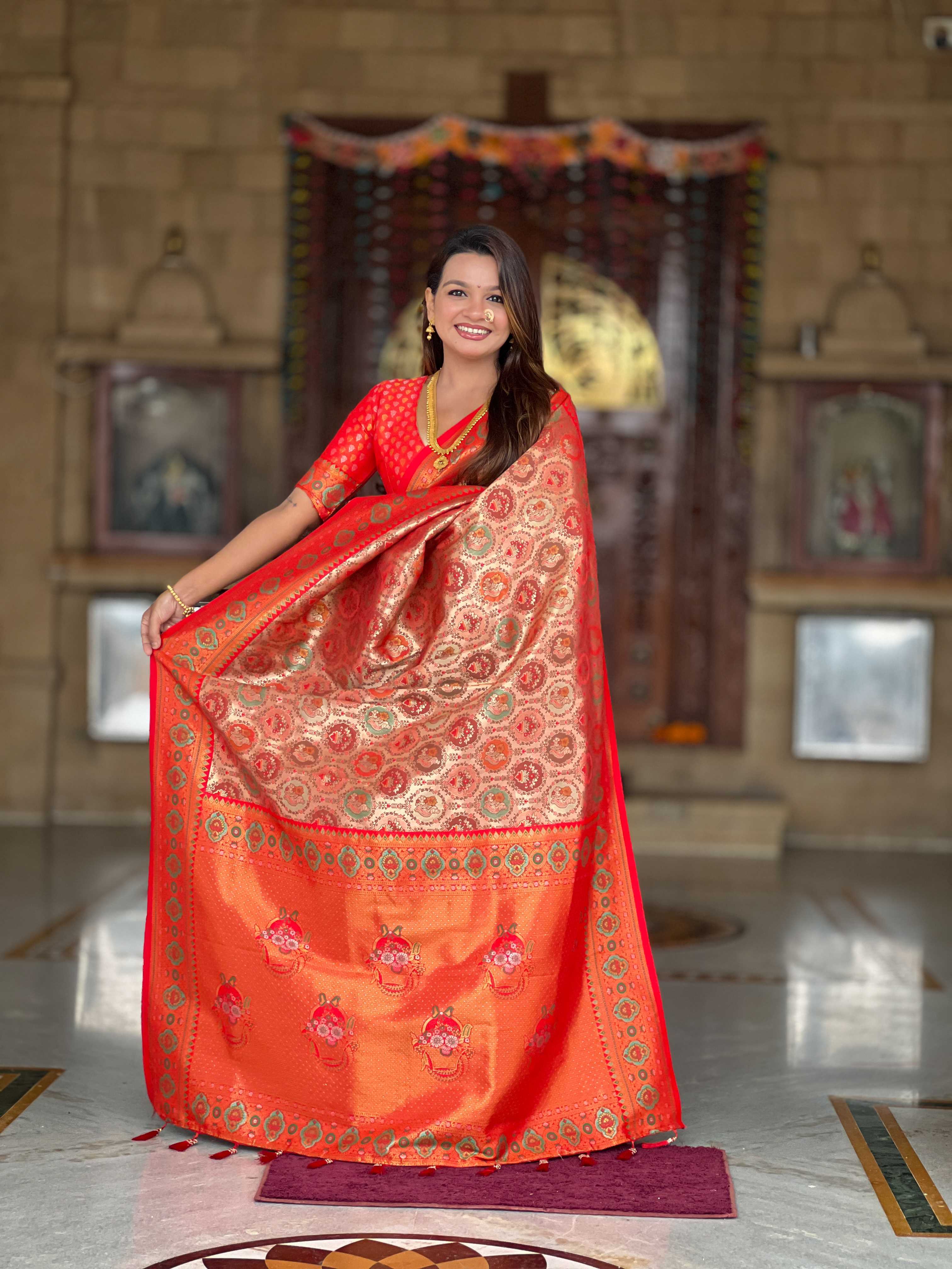 Red Soft kanjivaram silk saree with zari weaving Meenakari design all over the saree & Meenakari weawing Rich pallu with Meenakari weawing swan border & tessels attached at Pallu End. Blouse :- Soft silk weawing blouse piece