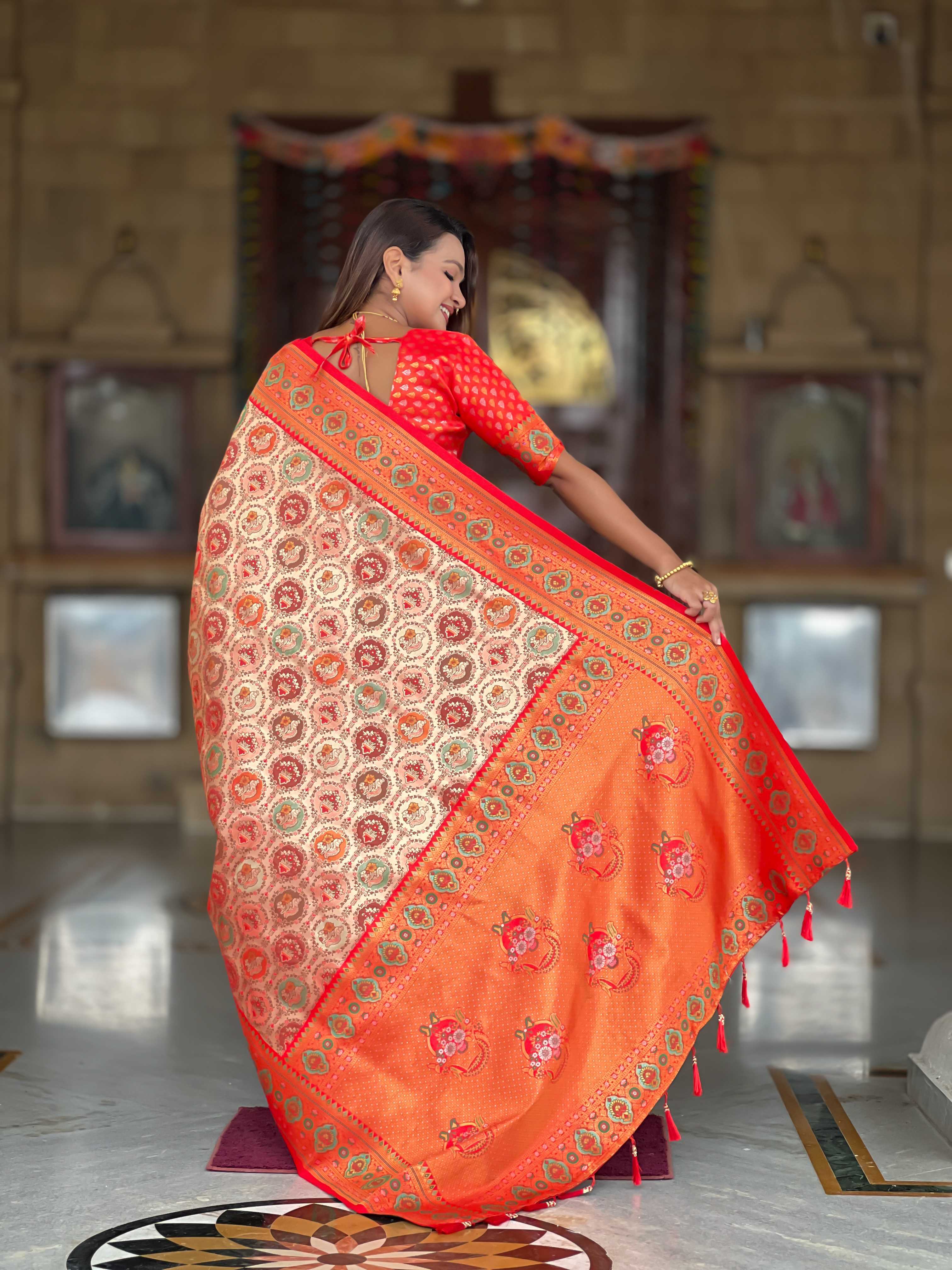 Red Soft kanjivaram silk saree with zari weaving Meenakari design all over the saree & Meenakari weawing Rich pallu with Meenakari weawing swan border & tessels attached at Pallu End. Blouse :- Soft silk weawing blouse piece