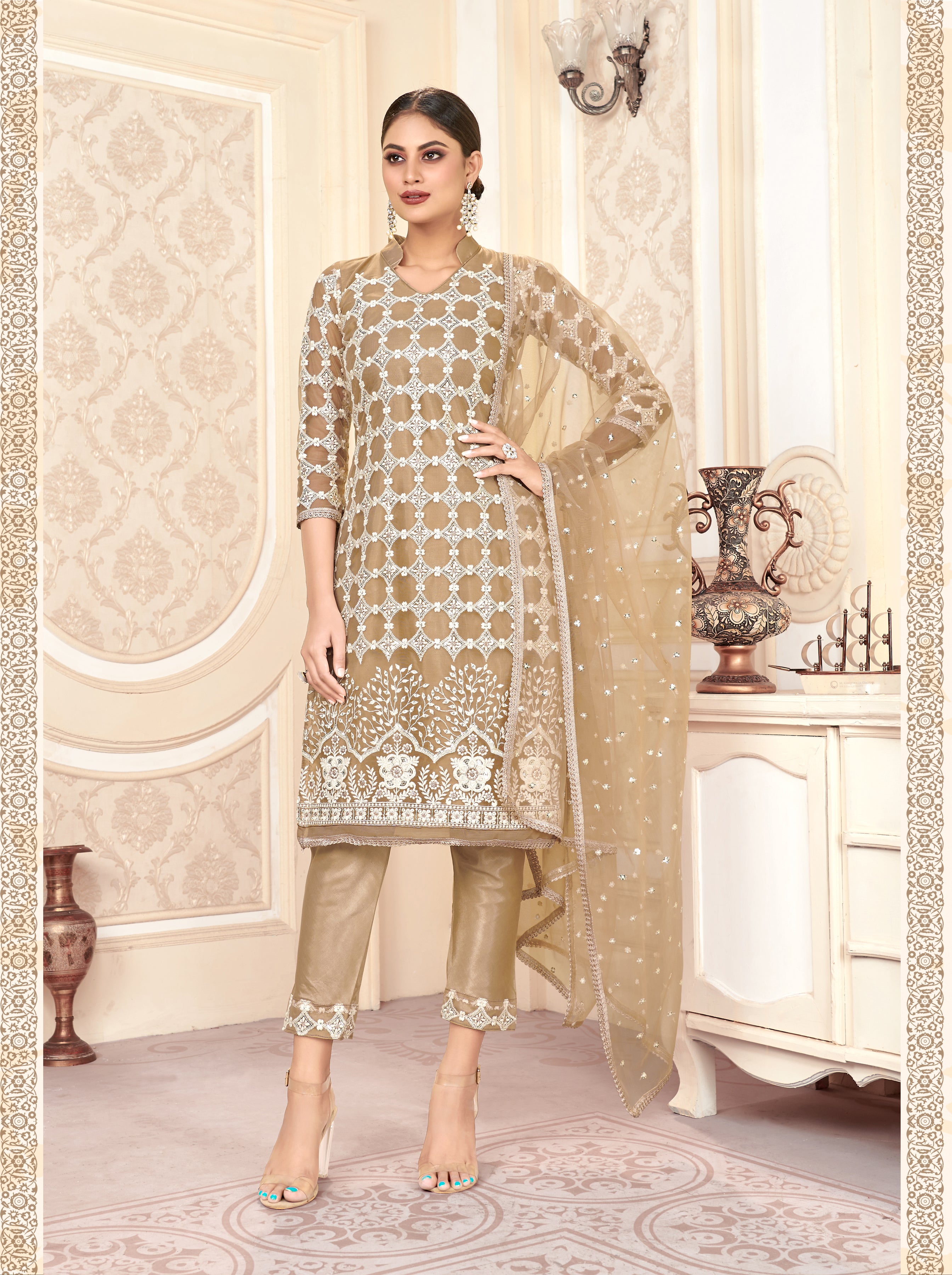 Chiku Women Net Heavy Embroidery Work Semi Stitch Dress Material.