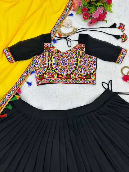 Black Navratri Lehenga Choli Set With Gujarati Embroidery and traditional Garba Dancer Motifs With Yellow Dupatta