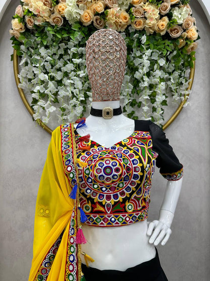 Black Navratri Lehenga Choli Set With Gujarati Embroidery and traditional Garba Dancer Motifs With Yellow Dupatta