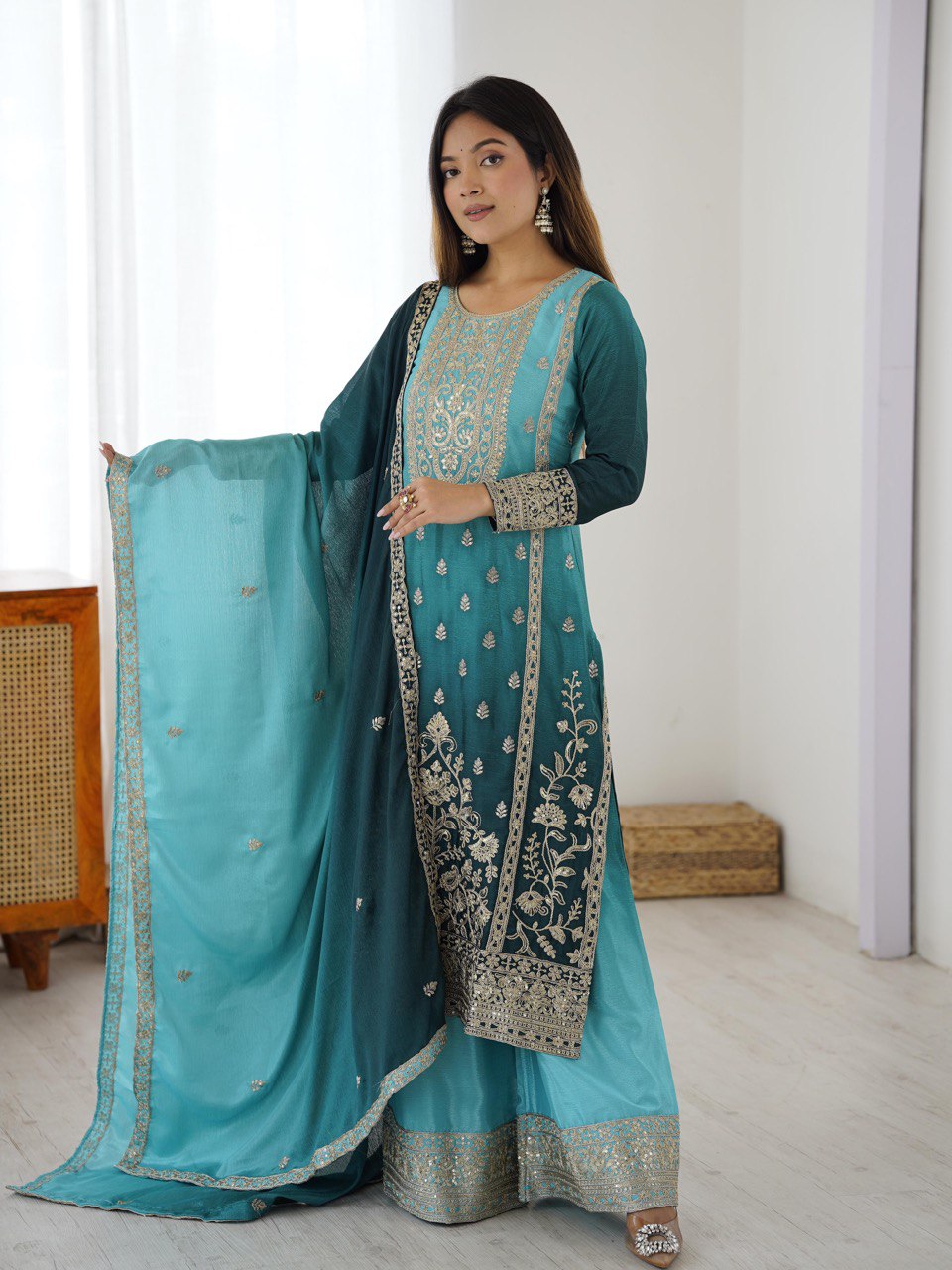 Elegant Aqua Blue Embroidered Kurta set with Intricate Zari Work And Matching Dupatta
