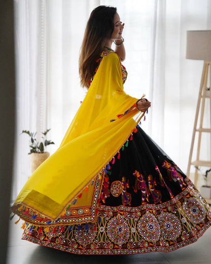 Black Navratri Lehenga Choli Set With Gujarati Embroidery and traditional Garba Dancer Motifs With Yellow Dupatta