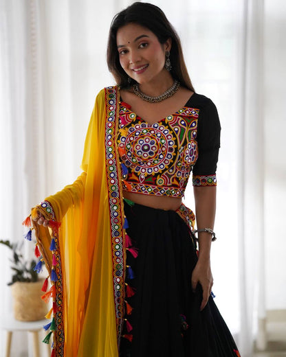 Black Navratri Lehenga Choli Set With Gujarati Embroidery and traditional Garba Dancer Motifs With Yellow Dupatta