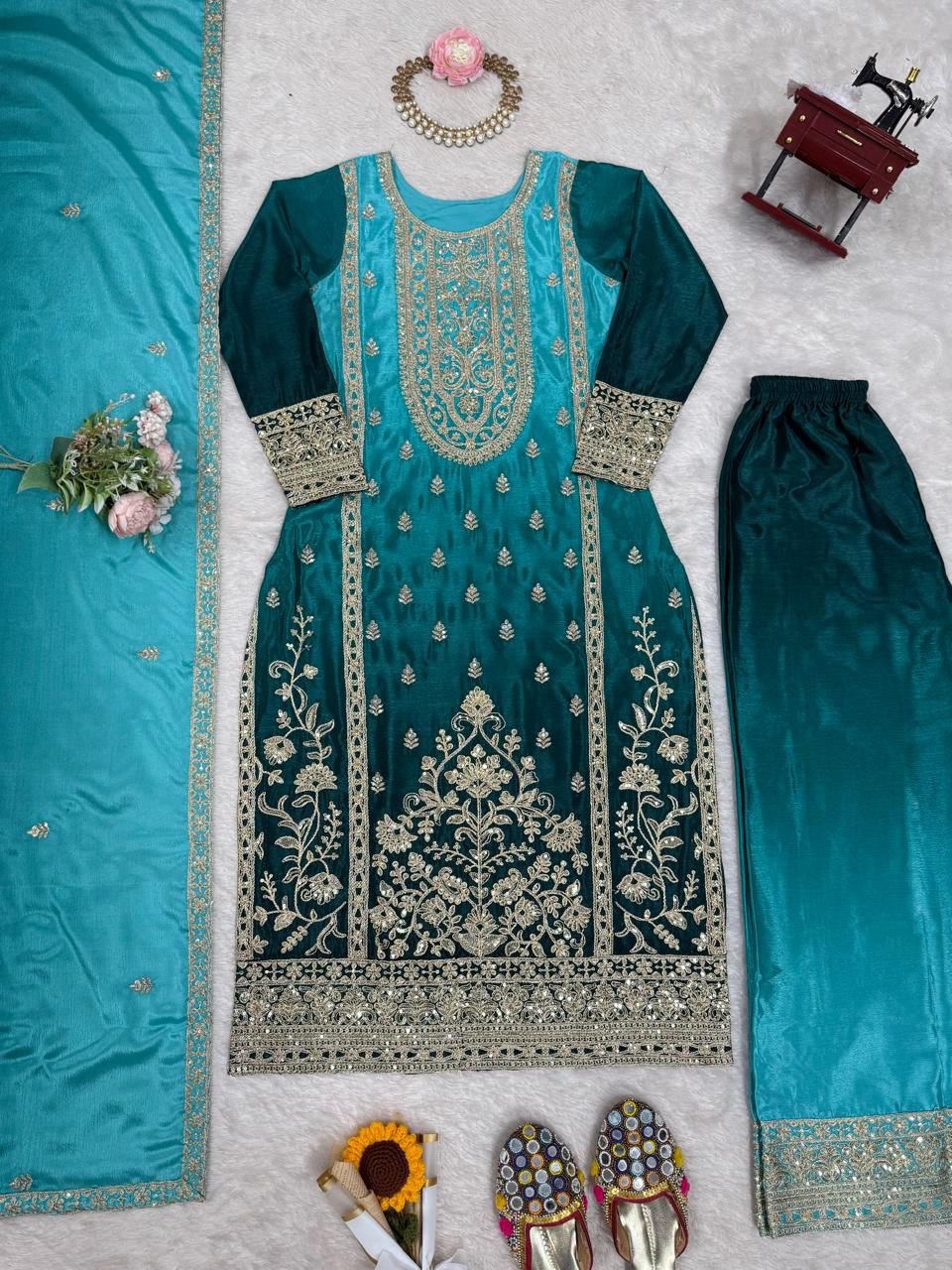 Elegant Aqua Blue Embroidered Kurta set with Intricate Zari Work And Matching Dupatta