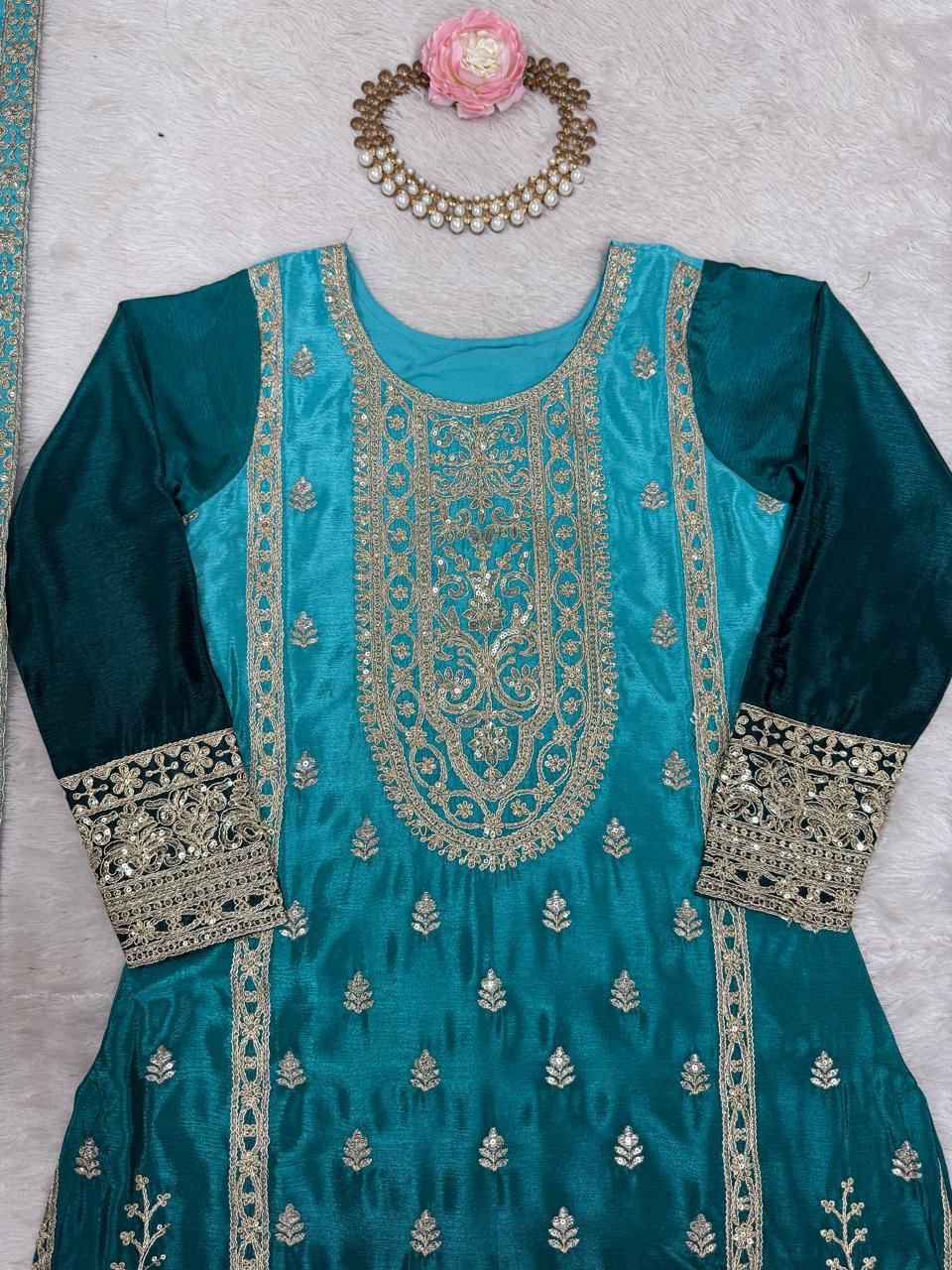 Elegant Aqua Blue Embroidered Kurta set with Intricate Zari Work And Matching Dupatta