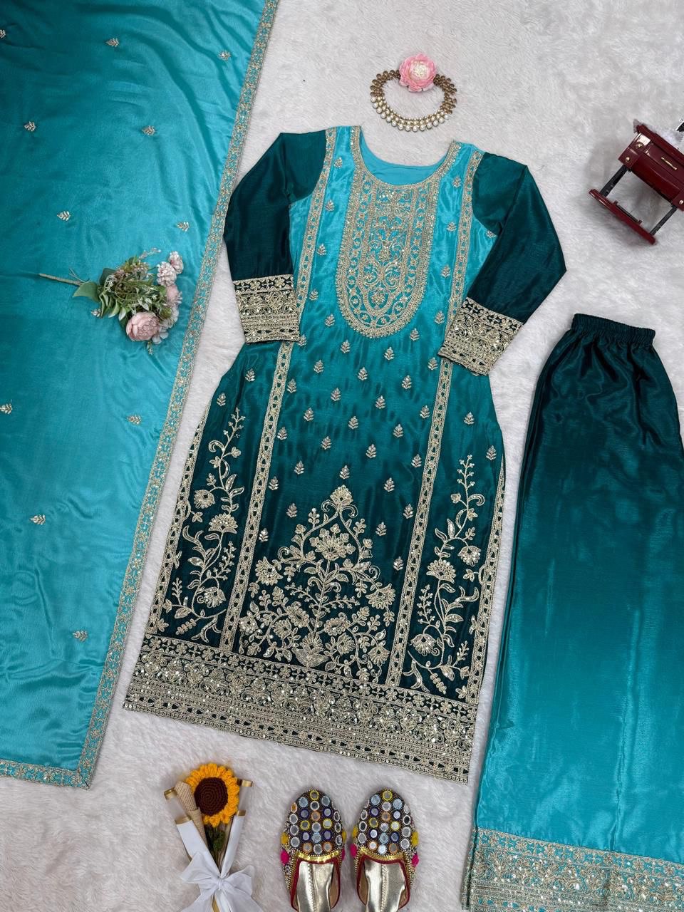 Elegant Aqua Blue Embroidered Kurta set with Intricate Zari Work And Matching Dupatta
