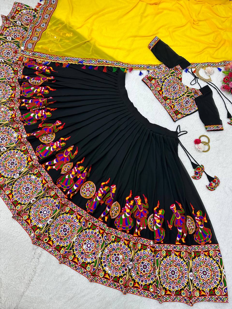 Black Navratri Lehenga Choli Set With Gujarati Embroidery and traditional Garba Dancer Motifs With Yellow Dupatta