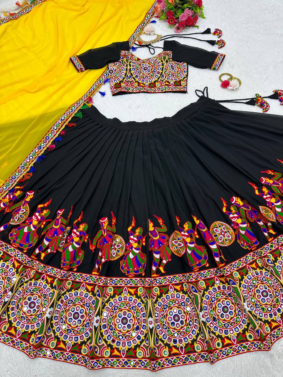 Black Navratri Lehenga Choli Set With Gujarati Embroidery and traditional Garba Dancer Motifs With Yellow Dupatta