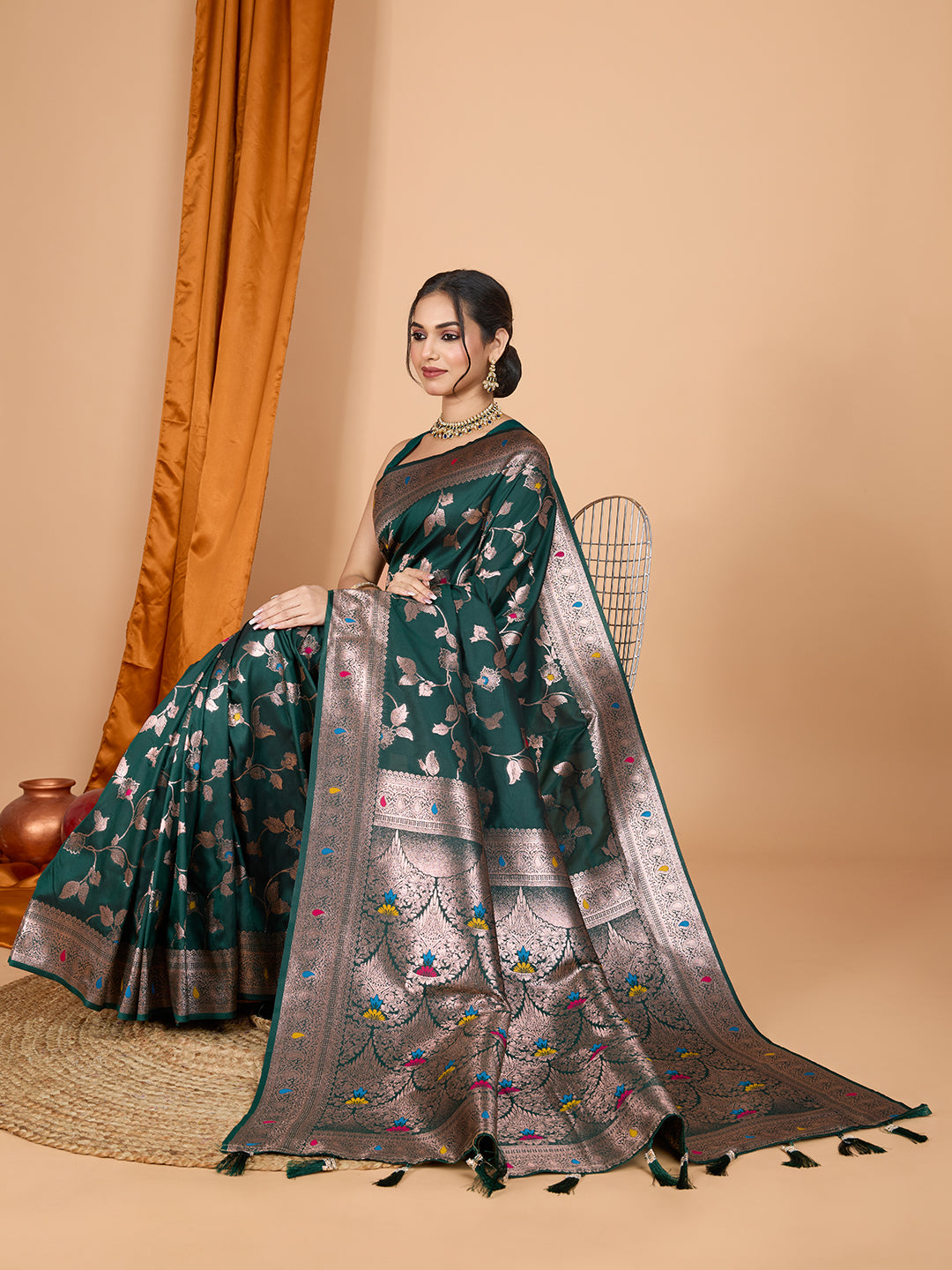 Dark Green Soft Banarasi Silk Saree Featuring Meenakari Zari Weaving & Tassels on Pallu