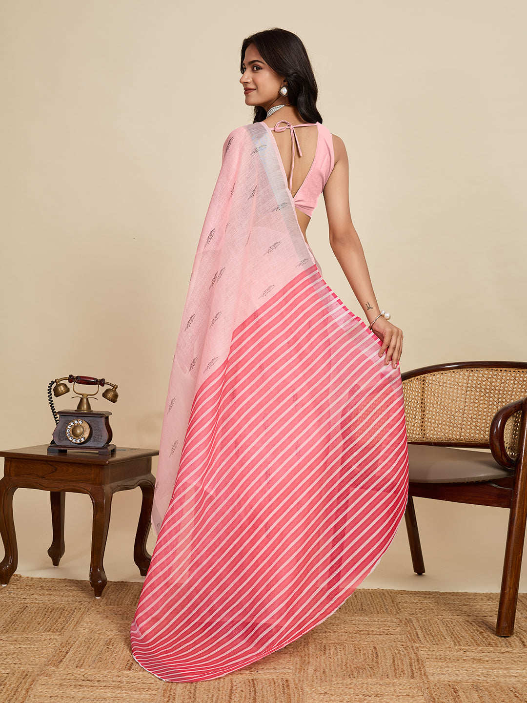 Women's Baby Pink Linen Saree with Jari Border and Blouse – Printed All Over Design