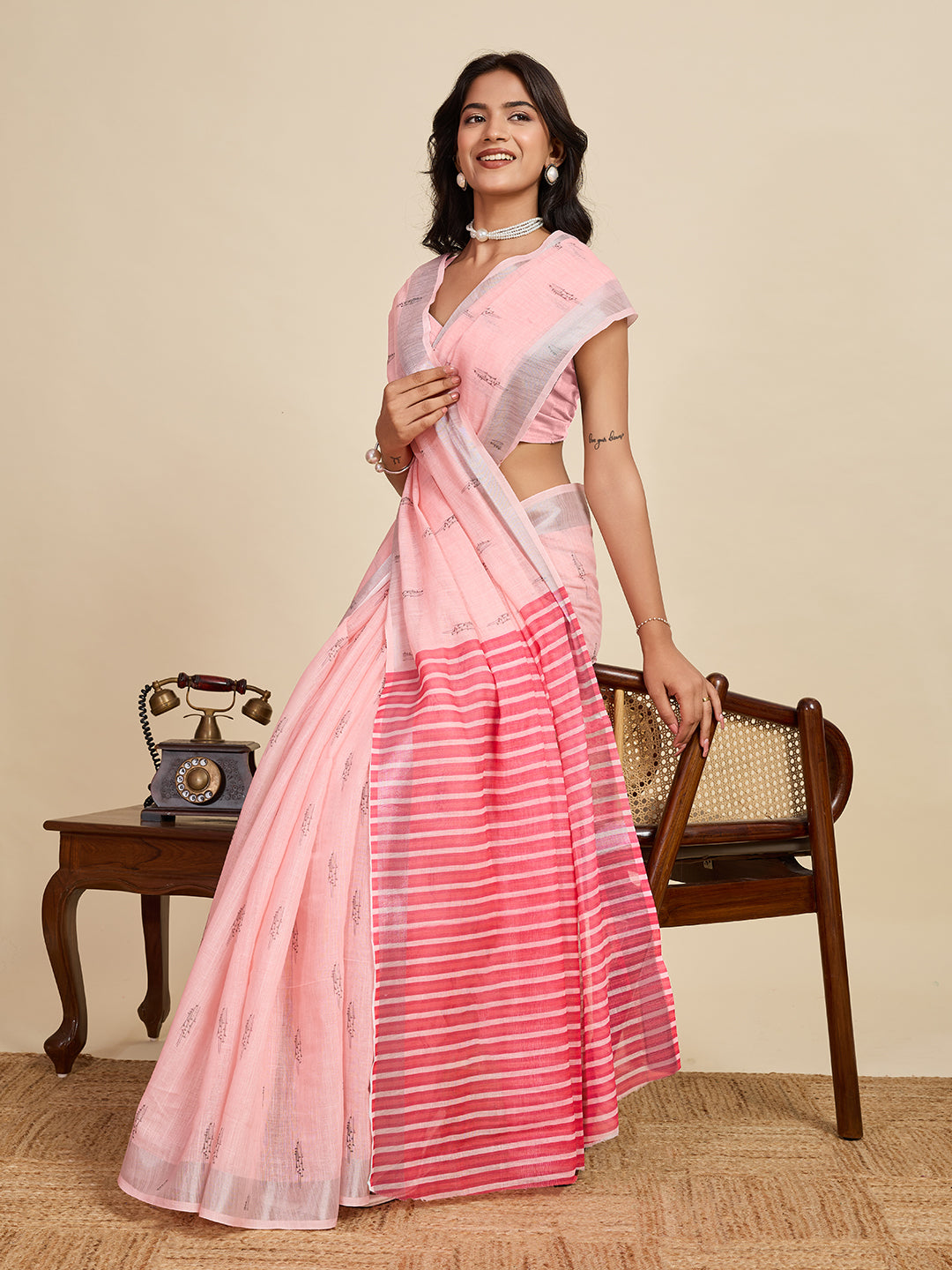 Women's Baby Pink Linen Saree with Jari Border and Blouse – Printed All Over Design