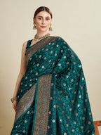 Soft Satin Silk Blue Saree with Rich Zari Motifs, Contrast Border & Elegant Blouse