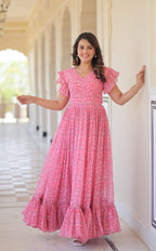 Faux Georgette Printed Pink Gown with Bell Sleeves | 7 Mtr Flair | Fancy V Neck | Full Stitched