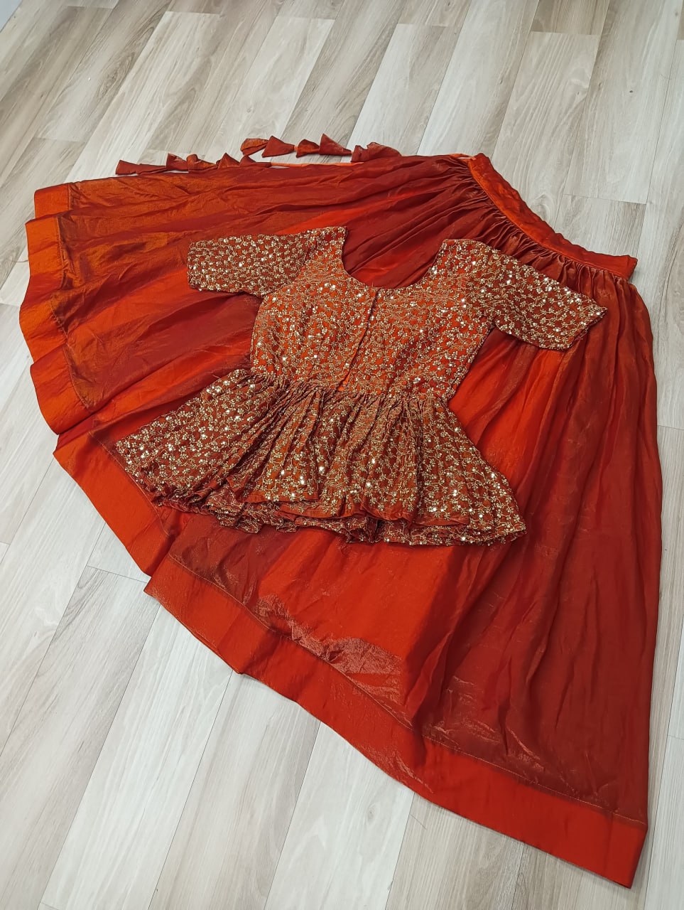 Fendy Fabric Sequins Embroidered Blouse with Plain Flared Orange Lehenga – Elegant Partywear Set (Full-Stitched)