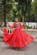 Orange Faux Georgette Gown with Laheriya & Bandhej Print and Kutchi Patch Work – Elegant Ethnic Wear (User can adjust From 38" to 44" for your body comfort)
