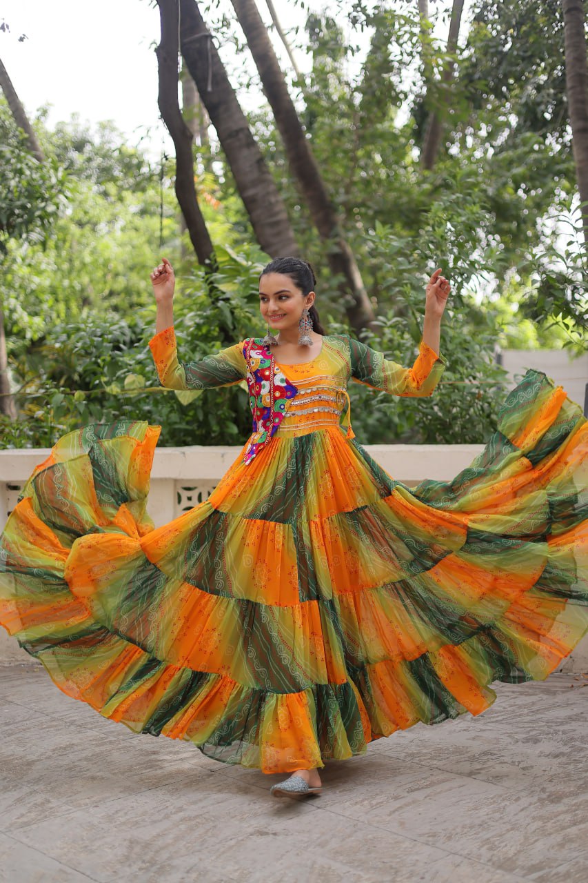 Mustard Faux Georgette Gown with Laheriya & Bandhej Print and Kutchi Patch Work – Elegant Ethnic Wear (User can adjust From 38" to 44" for your body comfort)