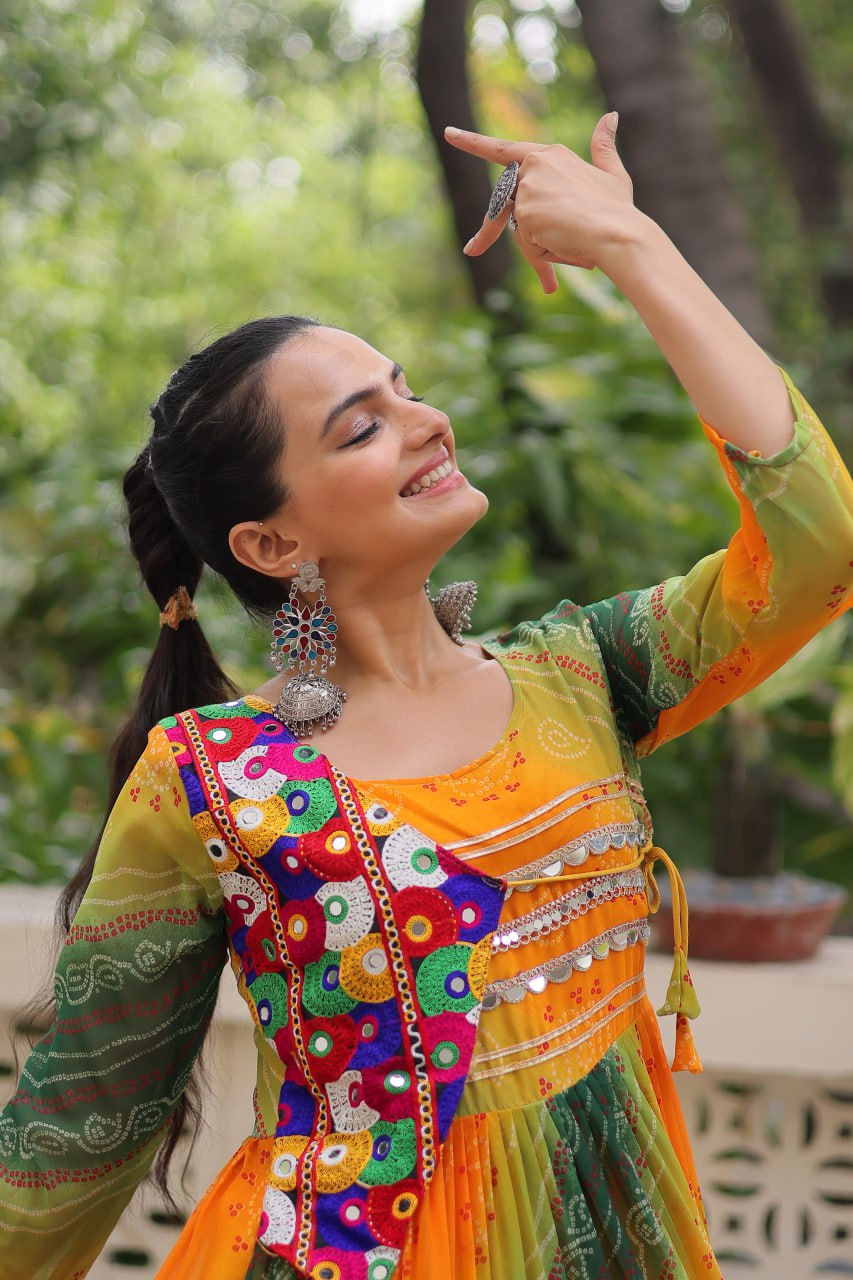 Mustard Faux Georgette Gown with Laheriya & Bandhej Print and Kutchi Patch Work – Elegant Ethnic Wear (User can adjust From 38" to 44" for your body comfort)