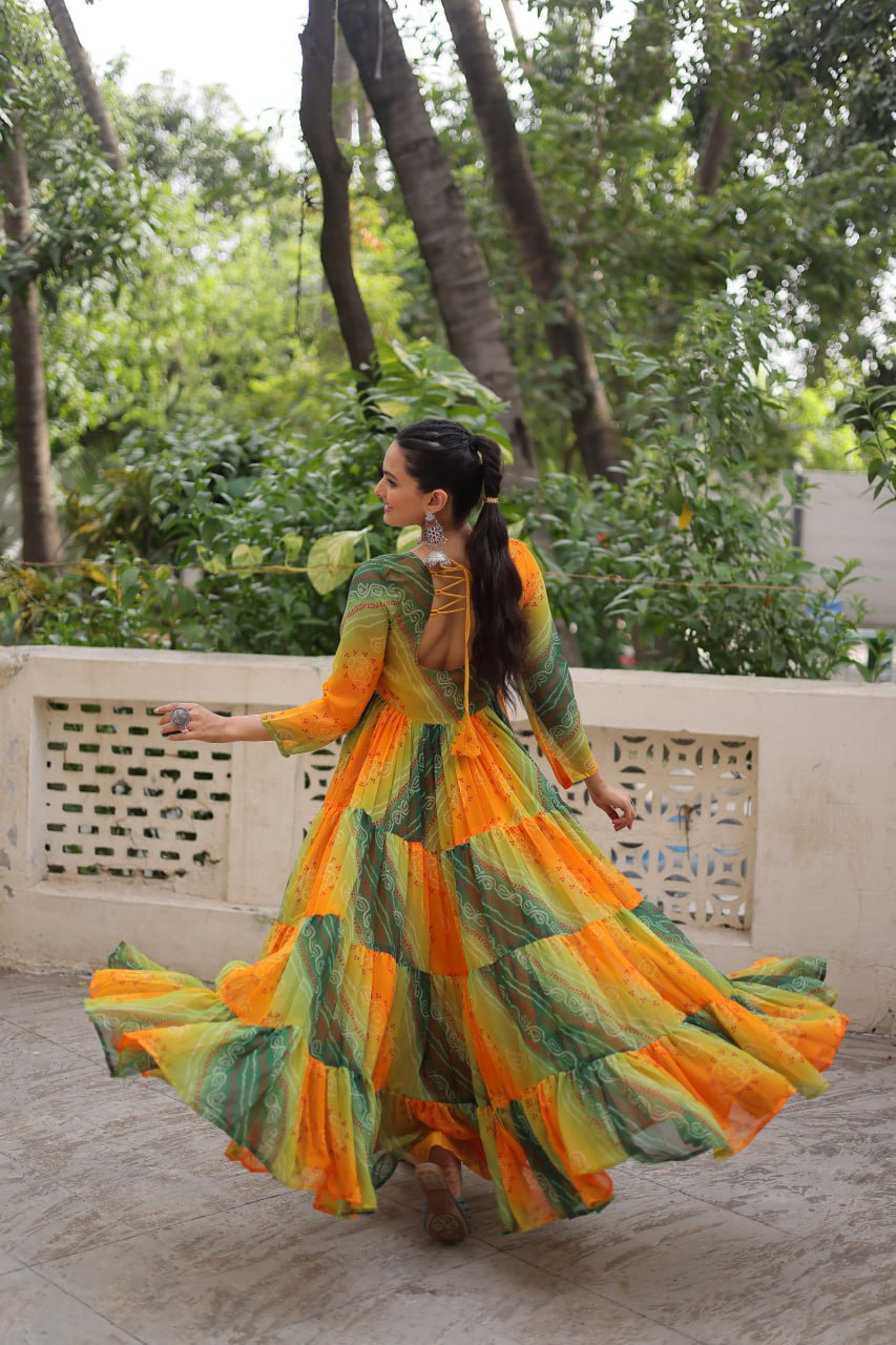 Mustard Faux Georgette Gown with Laheriya & Bandhej Print and Kutchi Patch Work – Elegant Ethnic Wear (User can adjust From 38" to 44" for your body comfort)