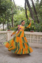 Mustard Faux Georgette Gown with Laheriya & Bandhej Print and Kutchi Patch Work – Elegant Ethnic Wear (User can adjust From 38" to 44" for your body comfort)