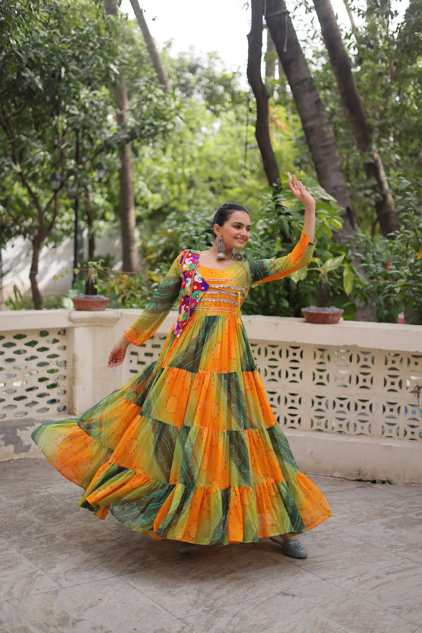 Mustard Faux Georgette Gown with Laheriya & Bandhej Print and Kutchi Patch Work – Elegant Ethnic Wear (User can adjust From 38" to 44" for your body comfort)