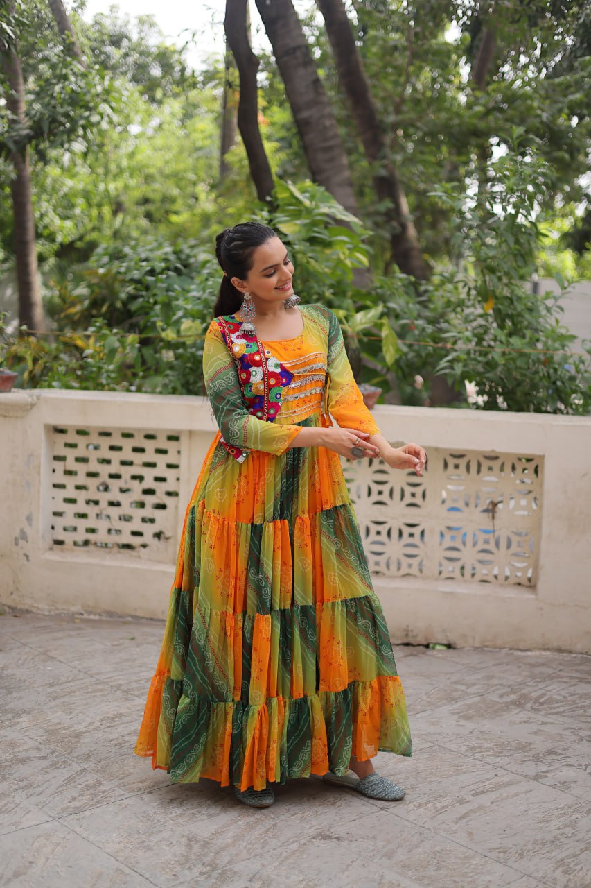 Mustard Faux Georgette Gown with Laheriya & Bandhej Print and Kutchi Patch Work – Elegant Ethnic Wear (User can adjust From 38" to 44" for your body comfort)