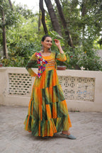 Mustard Faux Georgette Gown with Laheriya & Bandhej Print and Kutchi Patch Work – Elegant Ethnic Wear (User can adjust From 38" to 44" for your body comfort)