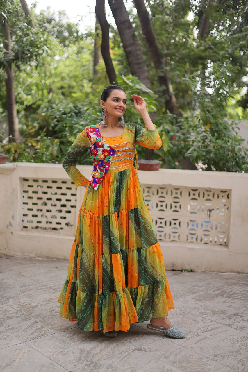 Mustard Faux Georgette Gown with Laheriya & Bandhej Print and Kutchi Patch Work – Elegant Ethnic Wear (User can adjust From 38" to 44" for your body comfort)