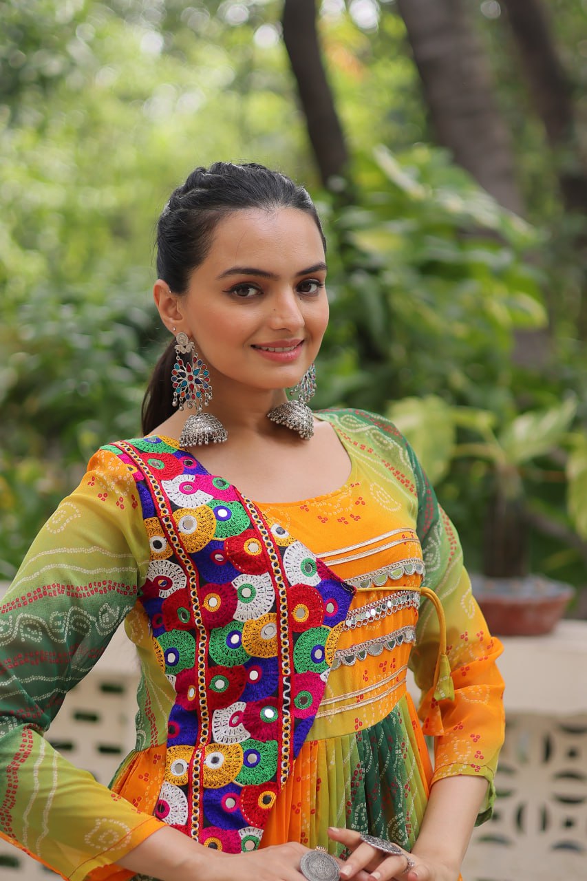 Mustard Faux Georgette Gown with Laheriya & Bandhej Print and Kutchi Patch Work – Elegant Ethnic Wear (User can adjust From 38" to 44" for your body comfort)
