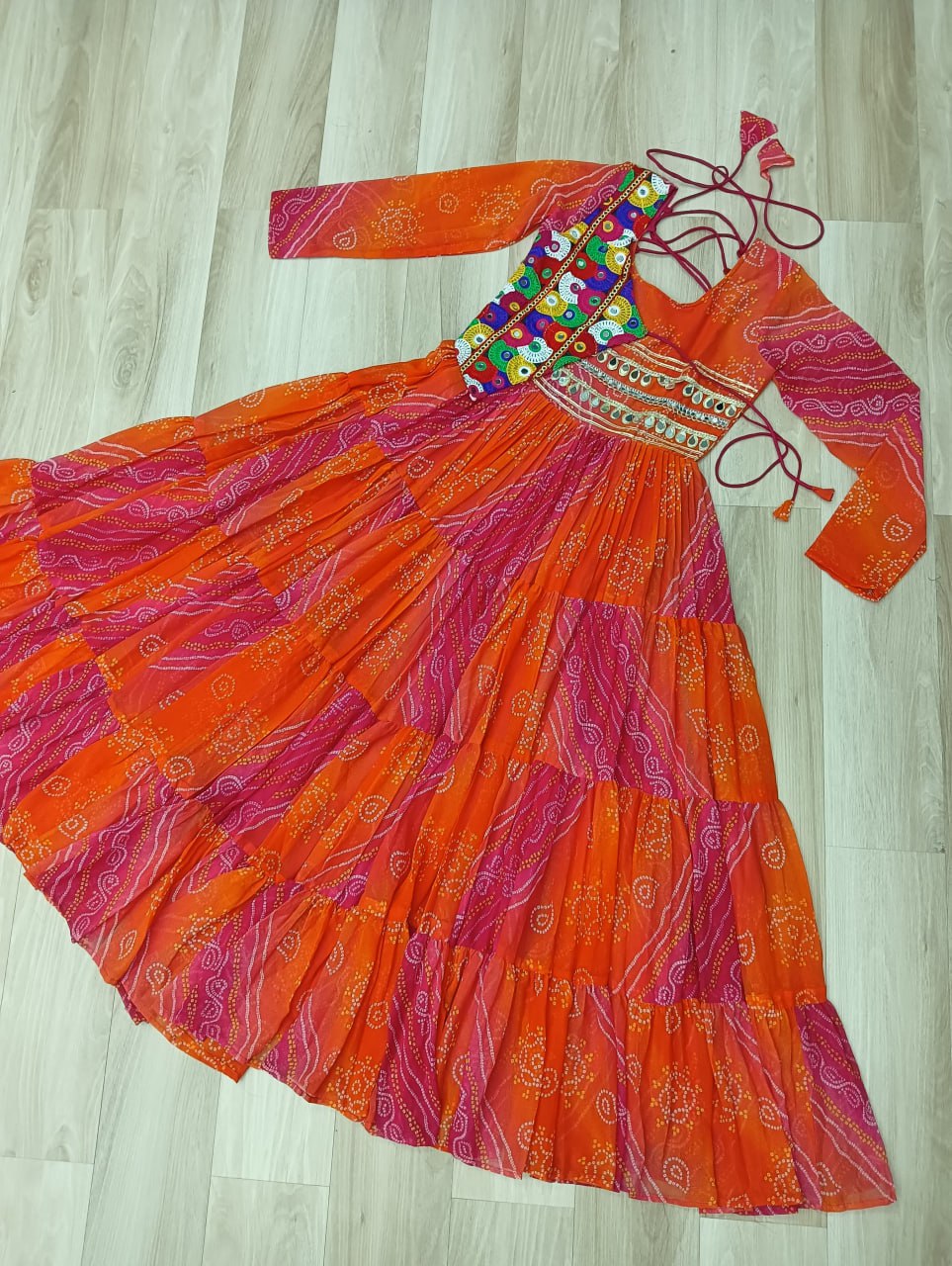 Orange Faux Georgette Gown with Laheriya & Bandhej Print and Kutchi Patch Work – Elegant Ethnic Wear (User can adjust From 38" to 44" for your body comfort)
