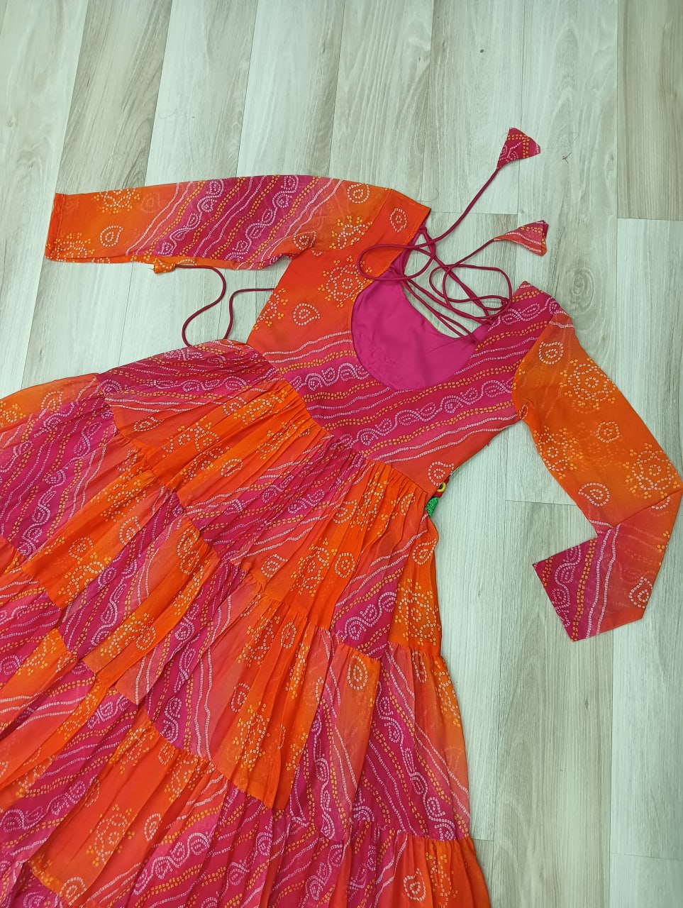 Orange Faux Georgette Gown with Laheriya & Bandhej Print and Kutchi Patch Work – Elegant Ethnic Wear (User can adjust From 38" to 44" for your body comfort)