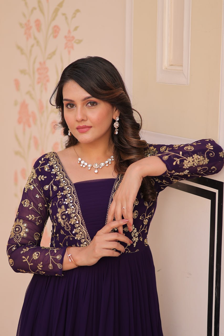 Designer Purple Gown in Faux Blooming with Sequins & Zari Embroidery – Full Flair & Fancy V Neck