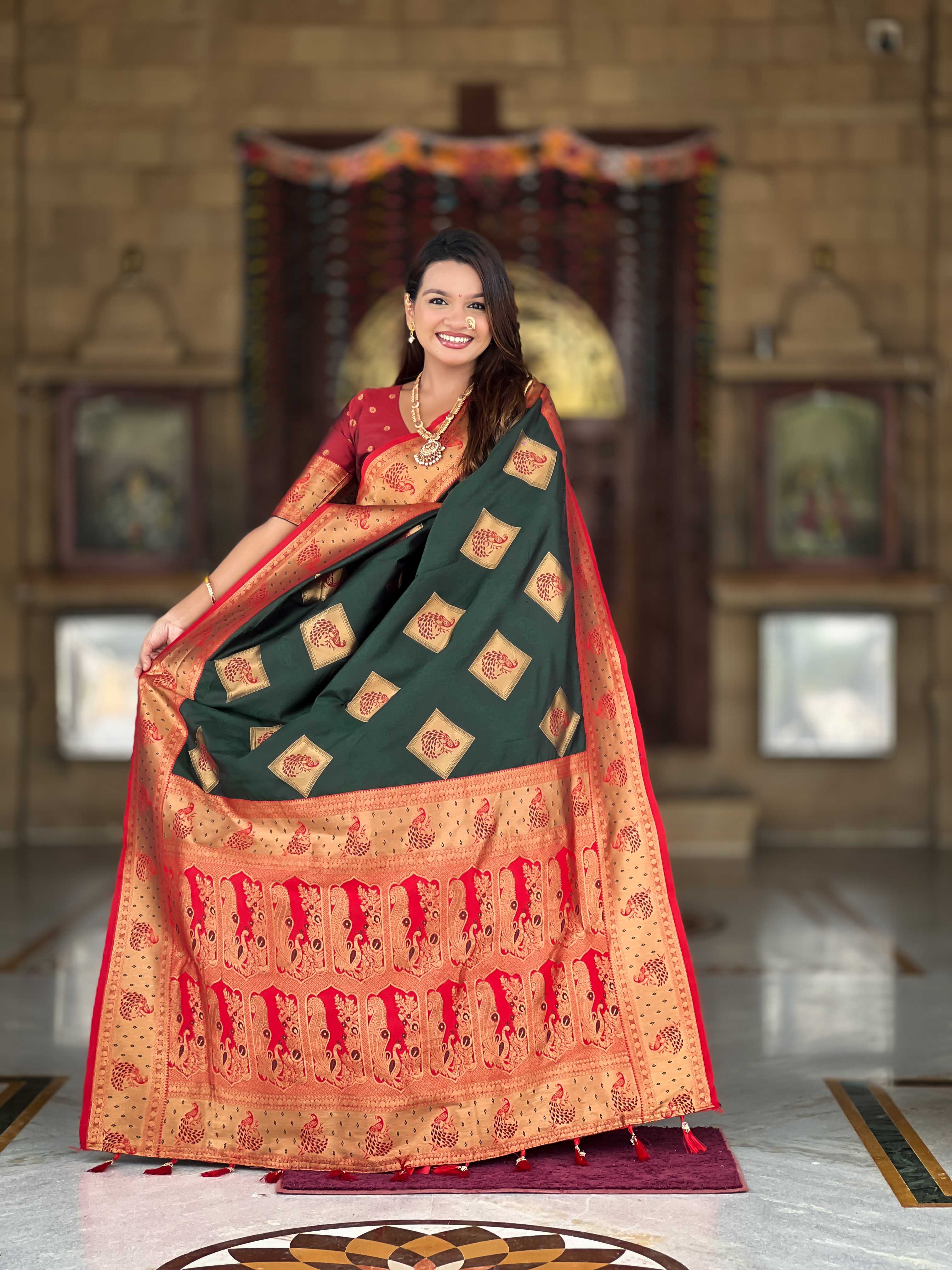 Bottle Green Soft Banarasi silk saree with zari weaving Meenakari design all over the saree & contrast weawing Rich pallu with contrast weawing border & tessels attached at Pallu End. Blouse :- Soft silk weawing blouse piece