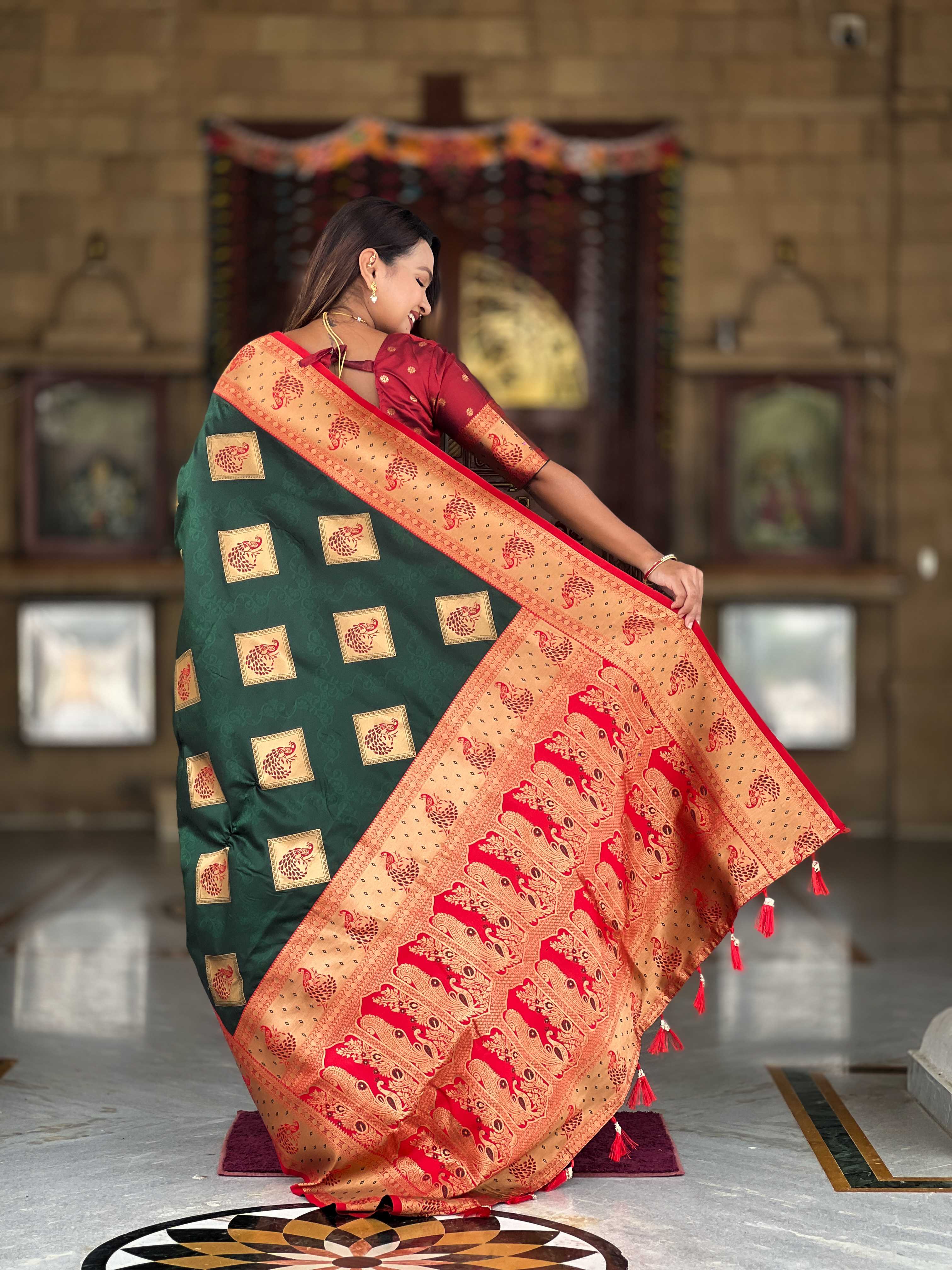 Bottle Green Soft Banarasi silk saree with zari weaving Meenakari design all over the saree & contrast weawing Rich pallu with contrast weawing border & tessels attached at Pallu End. Blouse :- Soft silk weawing blouse piece