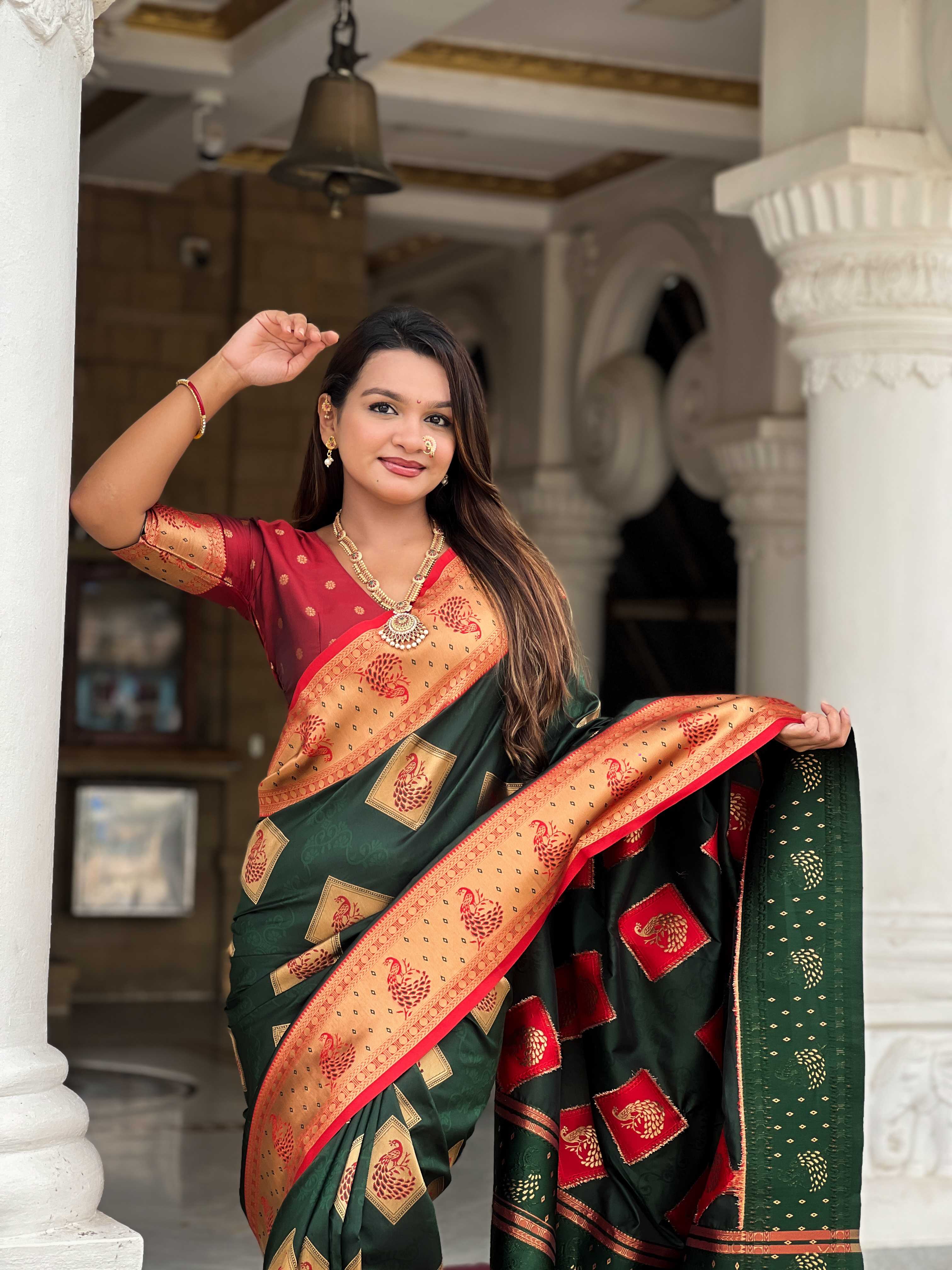 Bottle Green Soft Banarasi silk saree with zari weaving Meenakari design all over the saree & contrast weawing Rich pallu with contrast weawing border & tessels attached at Pallu End. Blouse :- Soft silk weawing blouse piece