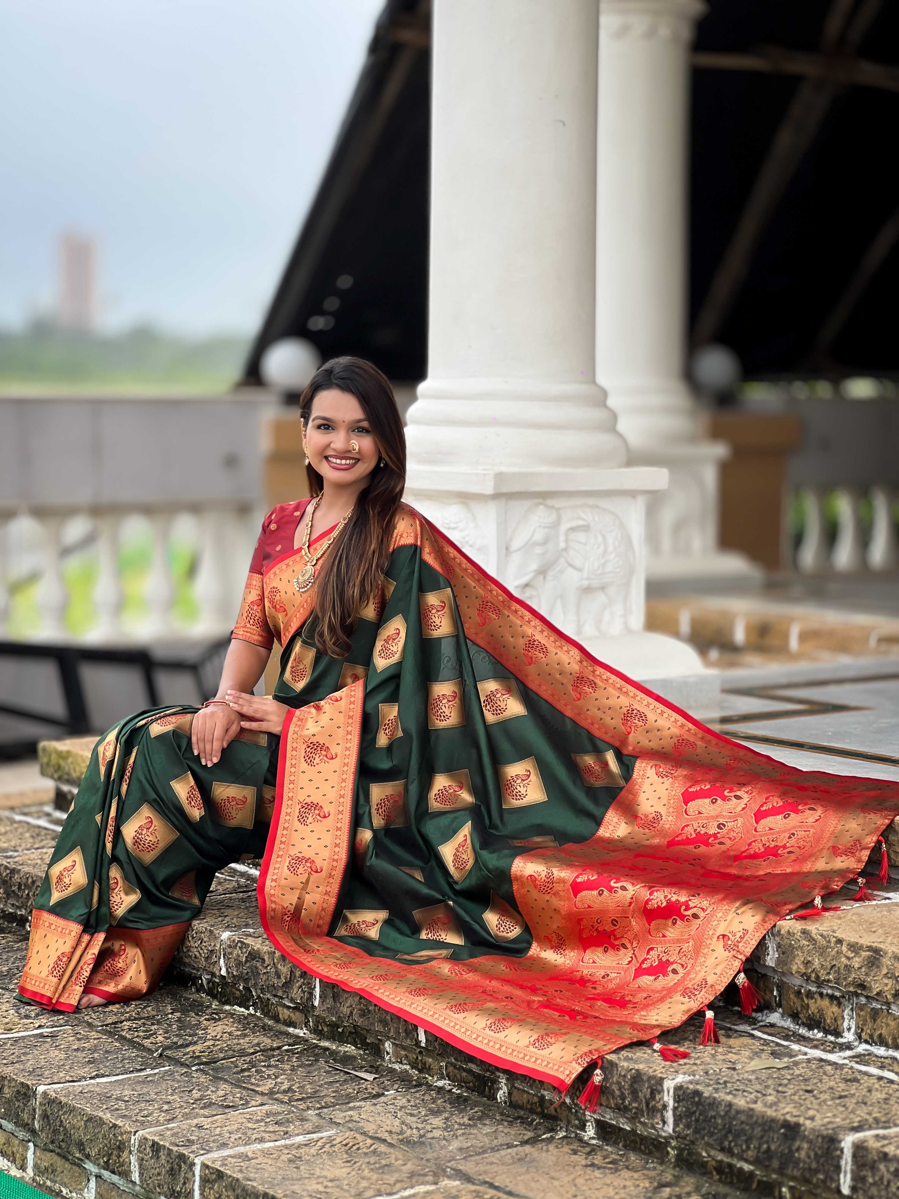 Bottle Green Soft Banarasi silk saree with zari weaving Meenakari design all over the saree & contrast weawing Rich pallu with contrast weawing border & tessels attached at Pallu End. Blouse :- Soft silk weawing blouse piece