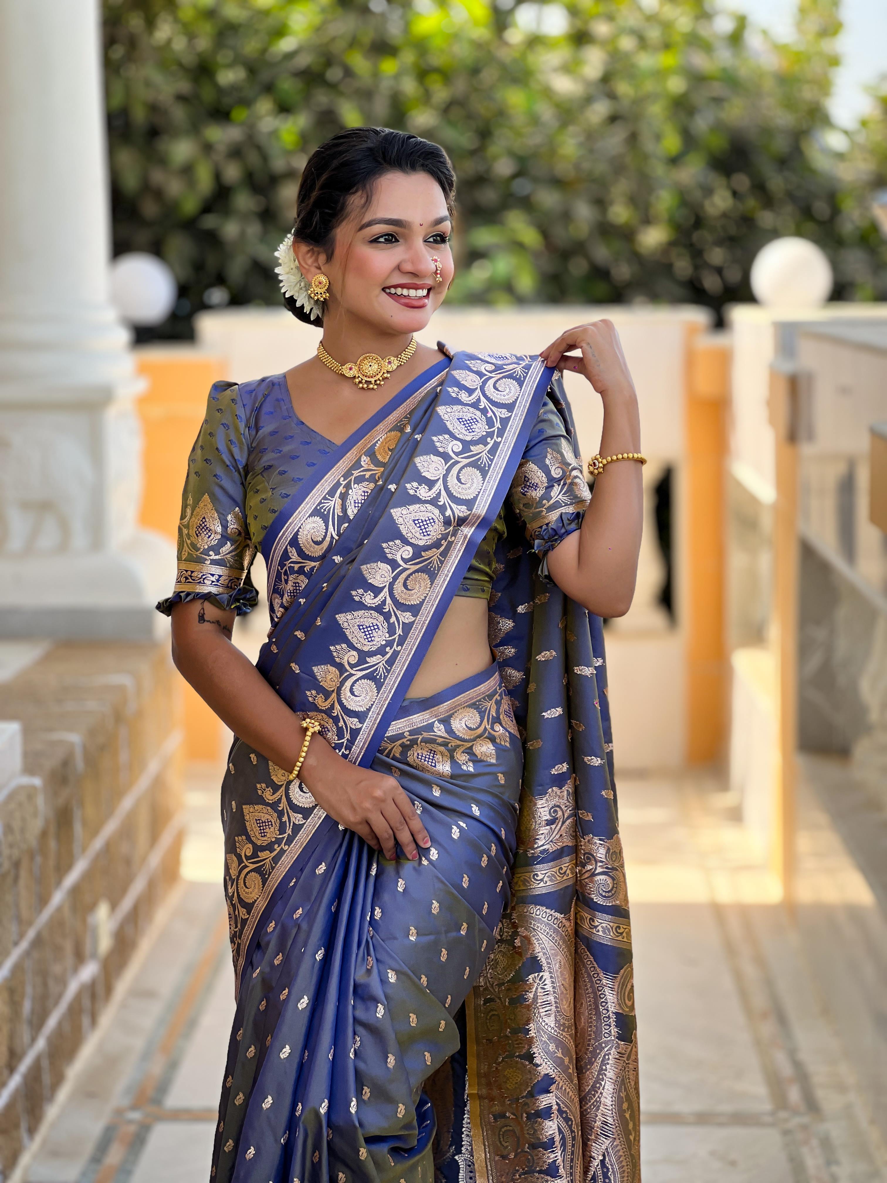 Blue Varni Fabrics Women Anjir Geometric Banarasi Silk Tassels and Latkans Saree comes With Matching Blouse