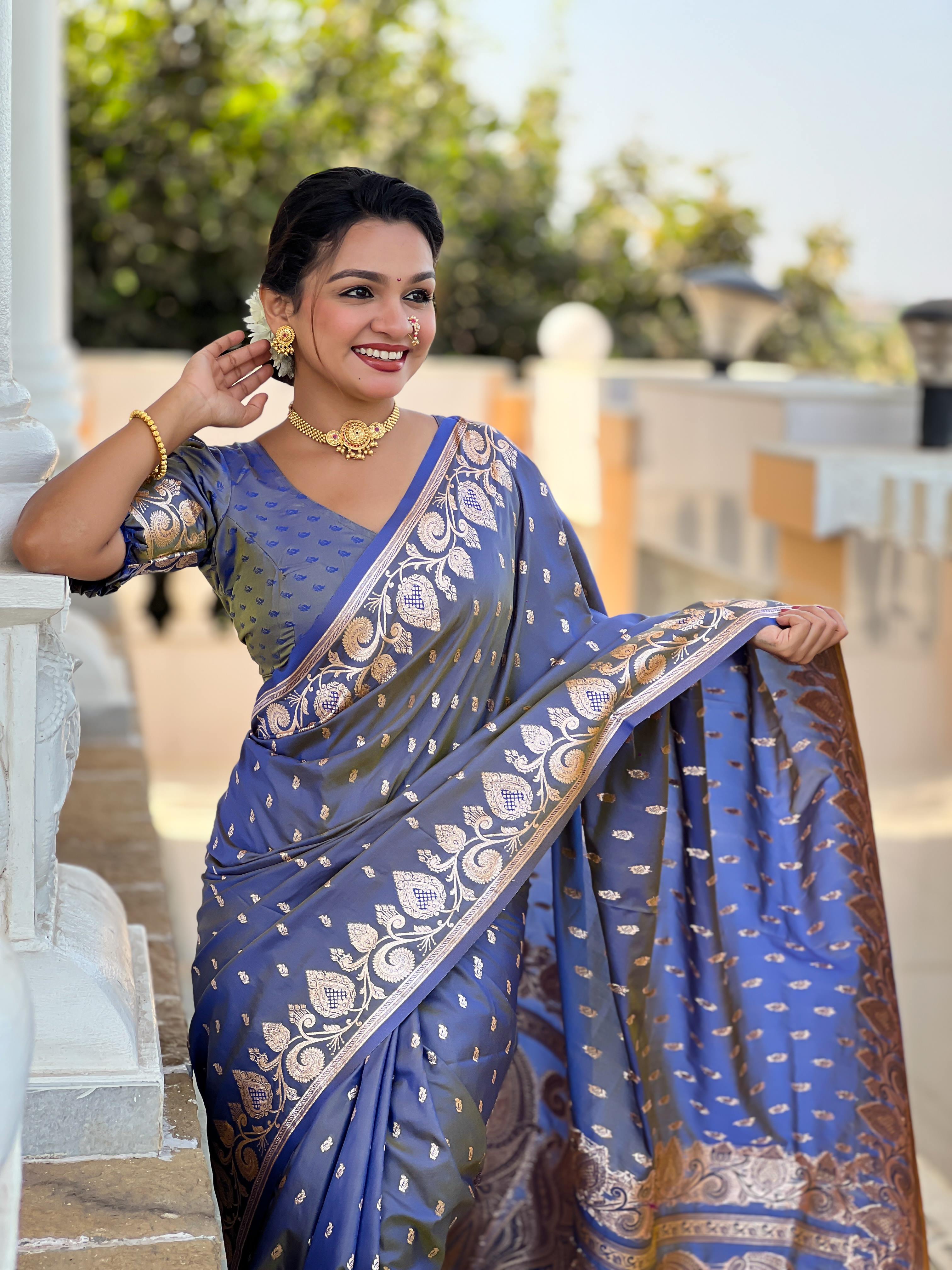 Blue Varni Fabrics Women Anjir Geometric Banarasi Silk Tassels and Latkans Saree comes With Matching Blouse