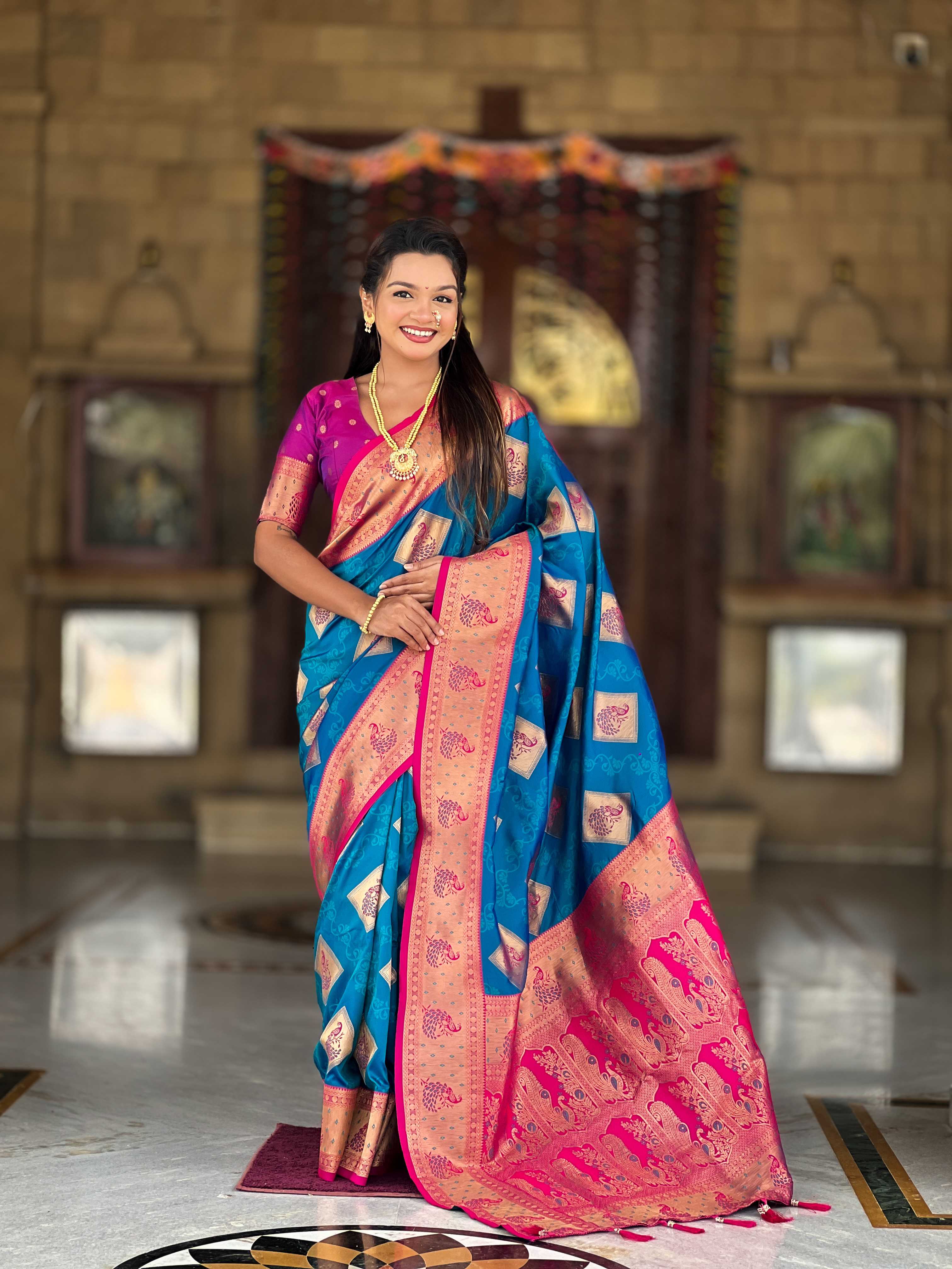 Firozi Soft Banarasi silk saree with zari weaving Meenakari design all over the saree & contrast weawing Rich pallu with contrast weawing border & tessels attached at Pallu End. Blouse :- Soft silk weawing blouse piece