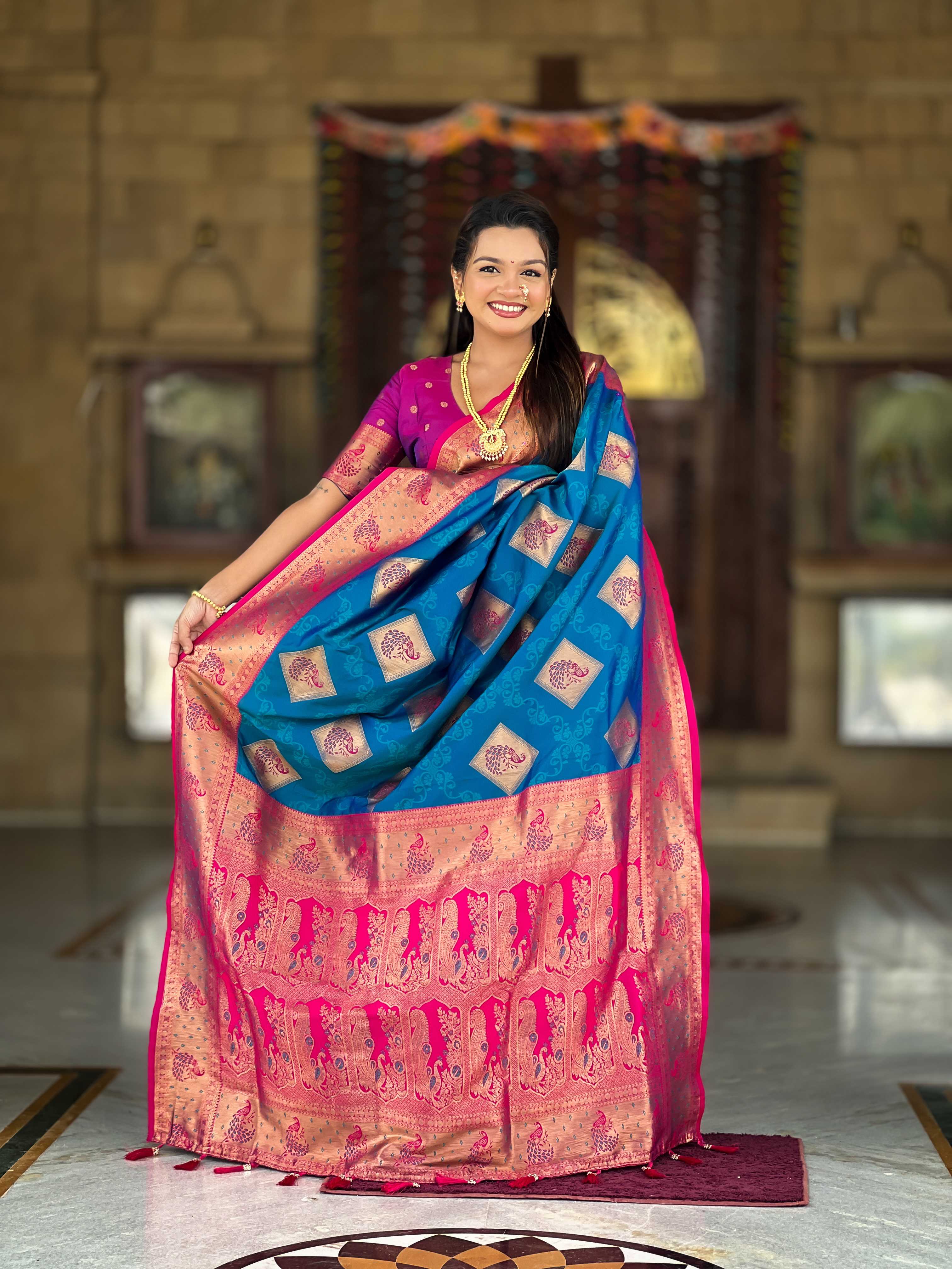 Firozi Soft Banarasi silk saree with zari weaving Meenakari design all over the saree & contrast weawing Rich pallu with contrast weawing border & tessels attached at Pallu End. Blouse :- Soft silk weawing blouse piece