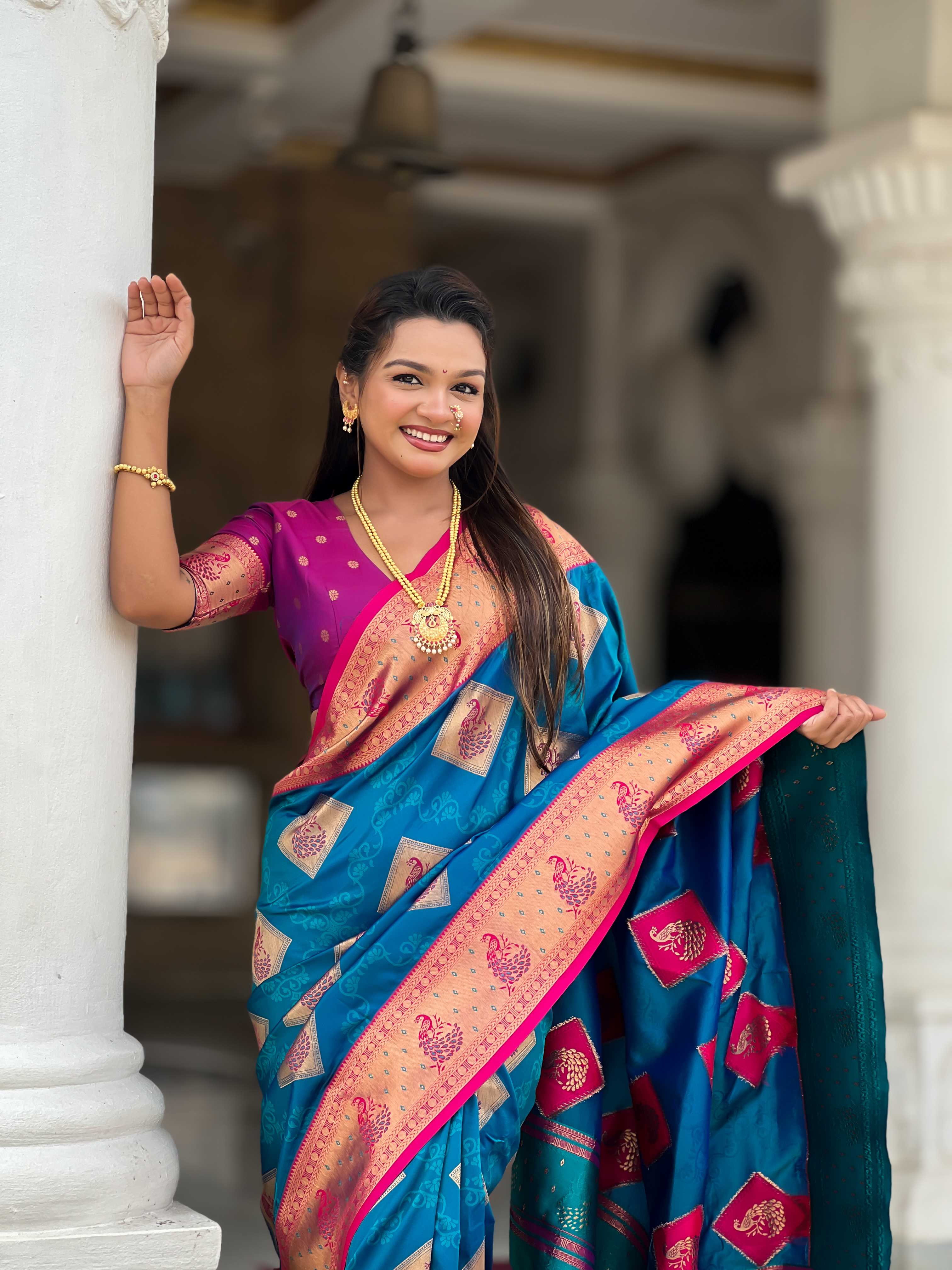 Firozi Soft Banarasi silk saree with zari weaving Meenakari design all over the saree & contrast weawing Rich pallu with contrast weawing border & tessels attached at Pallu End. Blouse :- Soft silk weawing blouse piece
