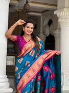 Firozi Soft Banarasi silk saree with zari weaving Meenakari design all over the saree & contrast weawing Rich pallu with contrast weawing border & tessels attached at Pallu End. Blouse :- Soft silk weawing blouse piece