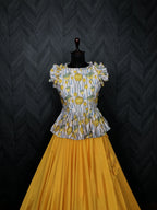 Grand Chinnon Yellow Lehenga with 8.5 Mtr Flair & Kalamkari Peplum Blouse – Full Stitched Set (Adjustable Size 38”–44”)