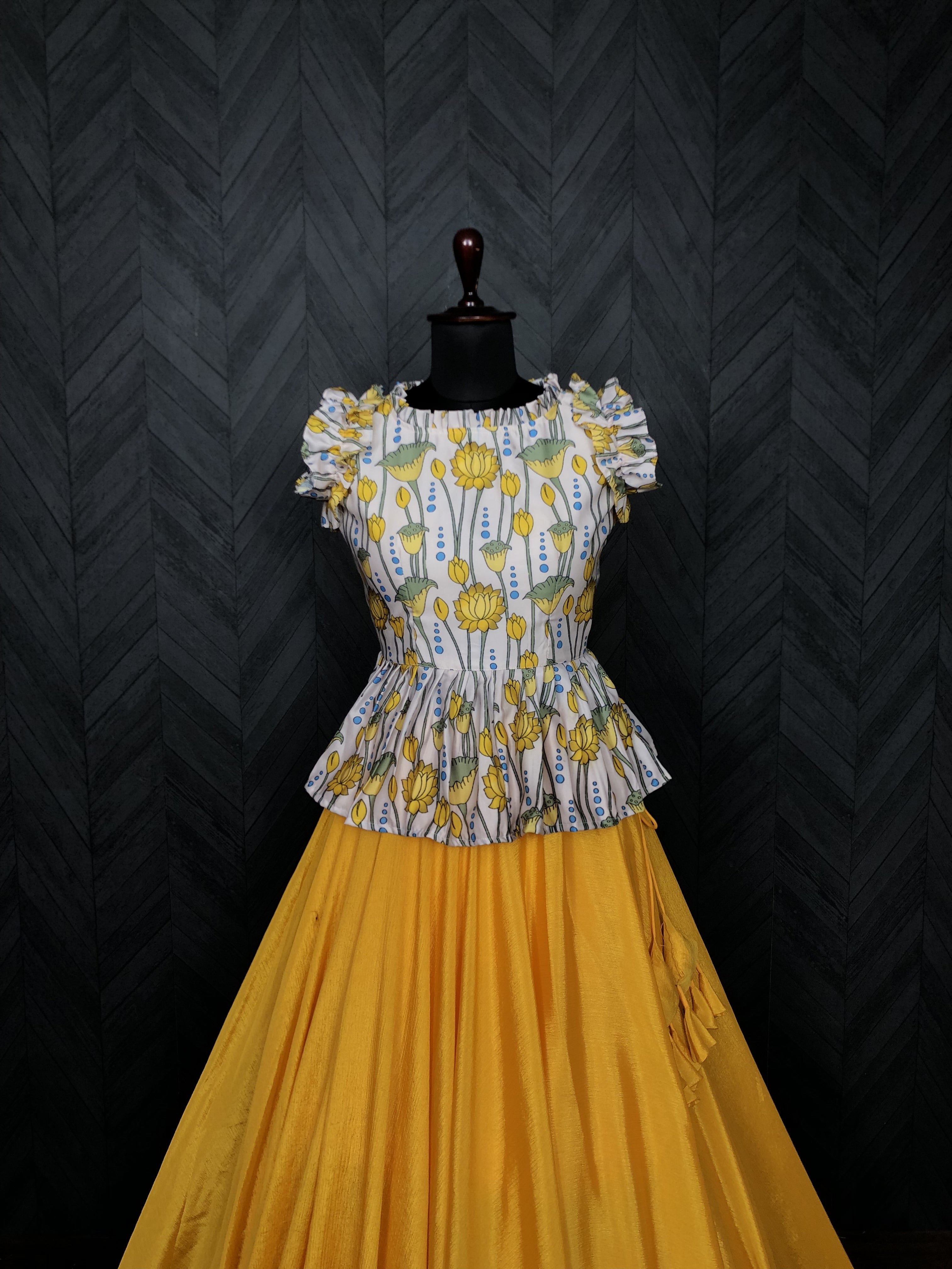 Grand Chinnon Yellow Lehenga with 8.5 Mtr Flair & Kalamkari Peplum Blouse – Full Stitched Set (Adjustable Size 38”–44”)