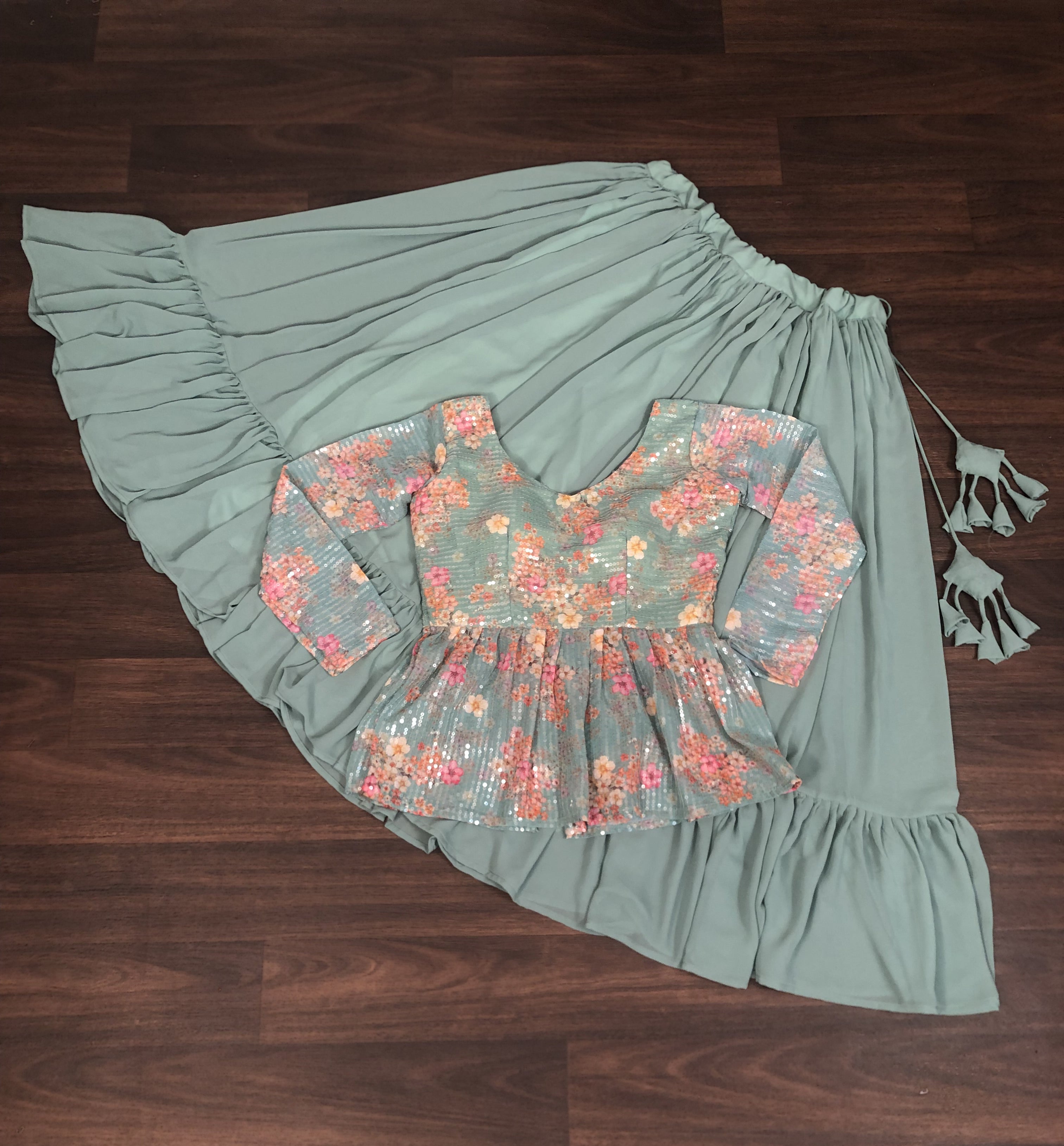 Stylish Faux Georgette Teal Lehenga with Floral Embroidered Peplum Blouse – Full Stitched Set (Adjustable Size 38"–44") | 5.5 Mtr Flair