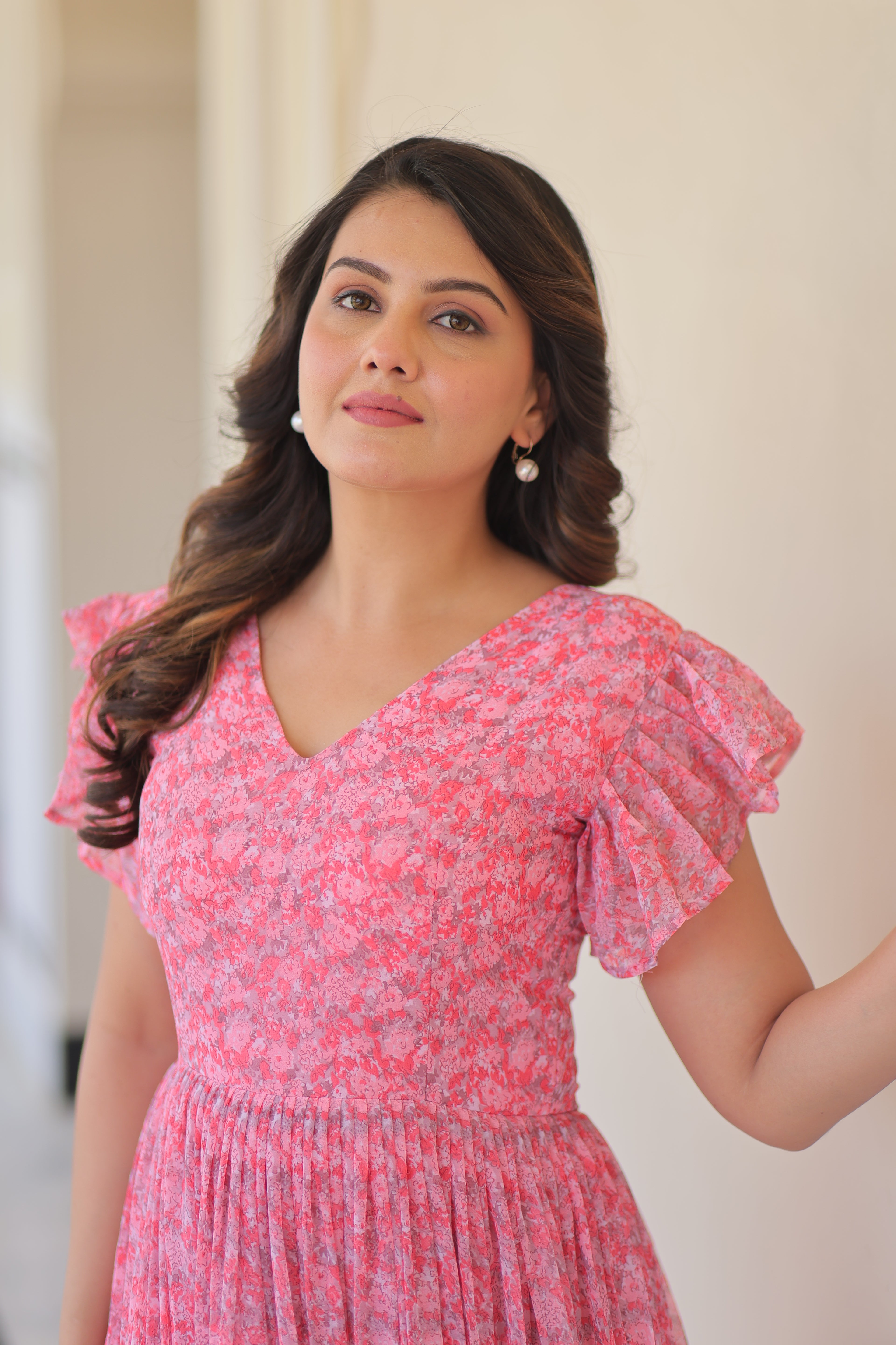 Faux Georgette Printed Pink Gown with Bell Sleeves | 7 Mtr Flair | Fancy V Neck | Full Stitched