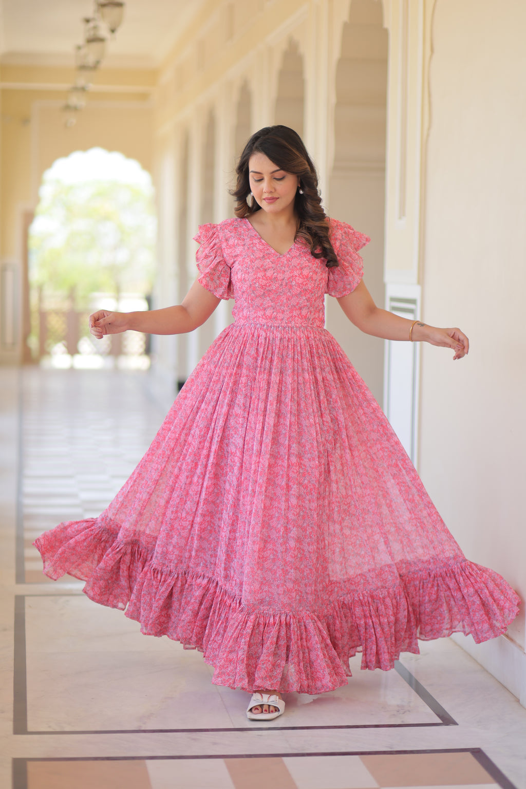 Faux Georgette Printed Pink Gown with Bell Sleeves | 7 Mtr Flair | Fancy V Neck | Full Stitched